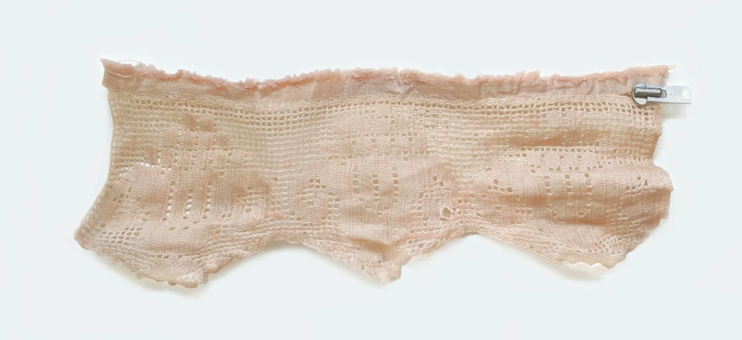    Strip   2019 Salvaged zipper and inherited lace in encaustic 7" x 16" x 1" 