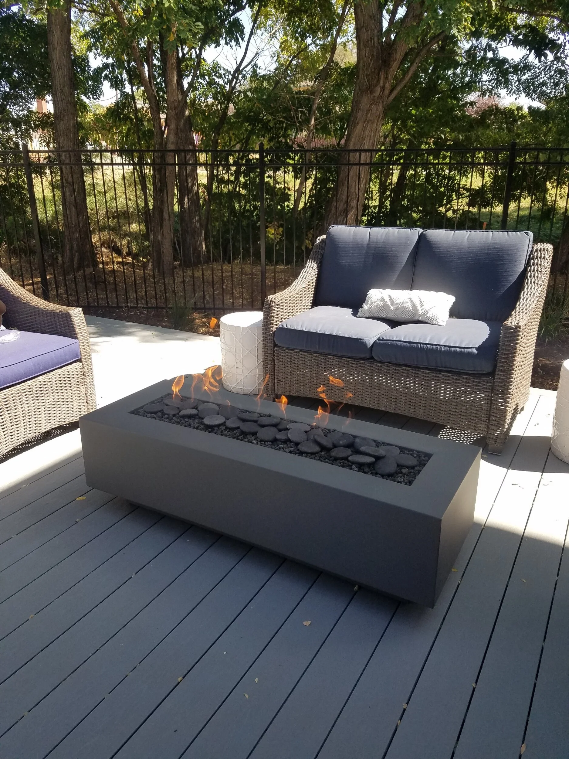 Telluride Steel Fire Pit with black lava and ceramic stones