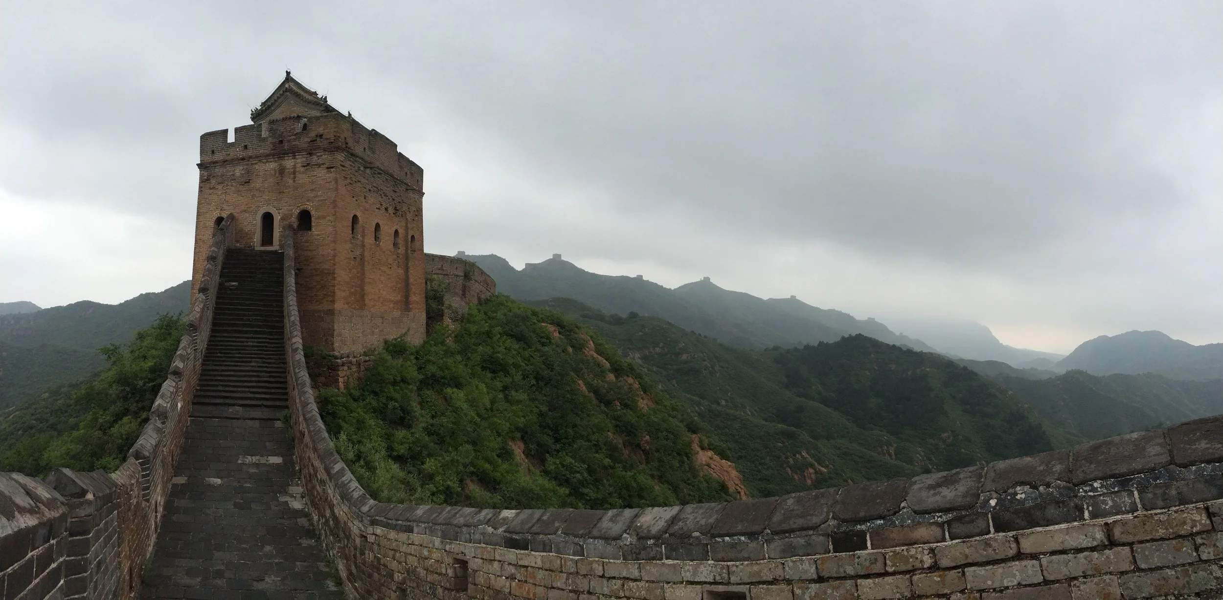 Restored section of Great Wall with many gates in background