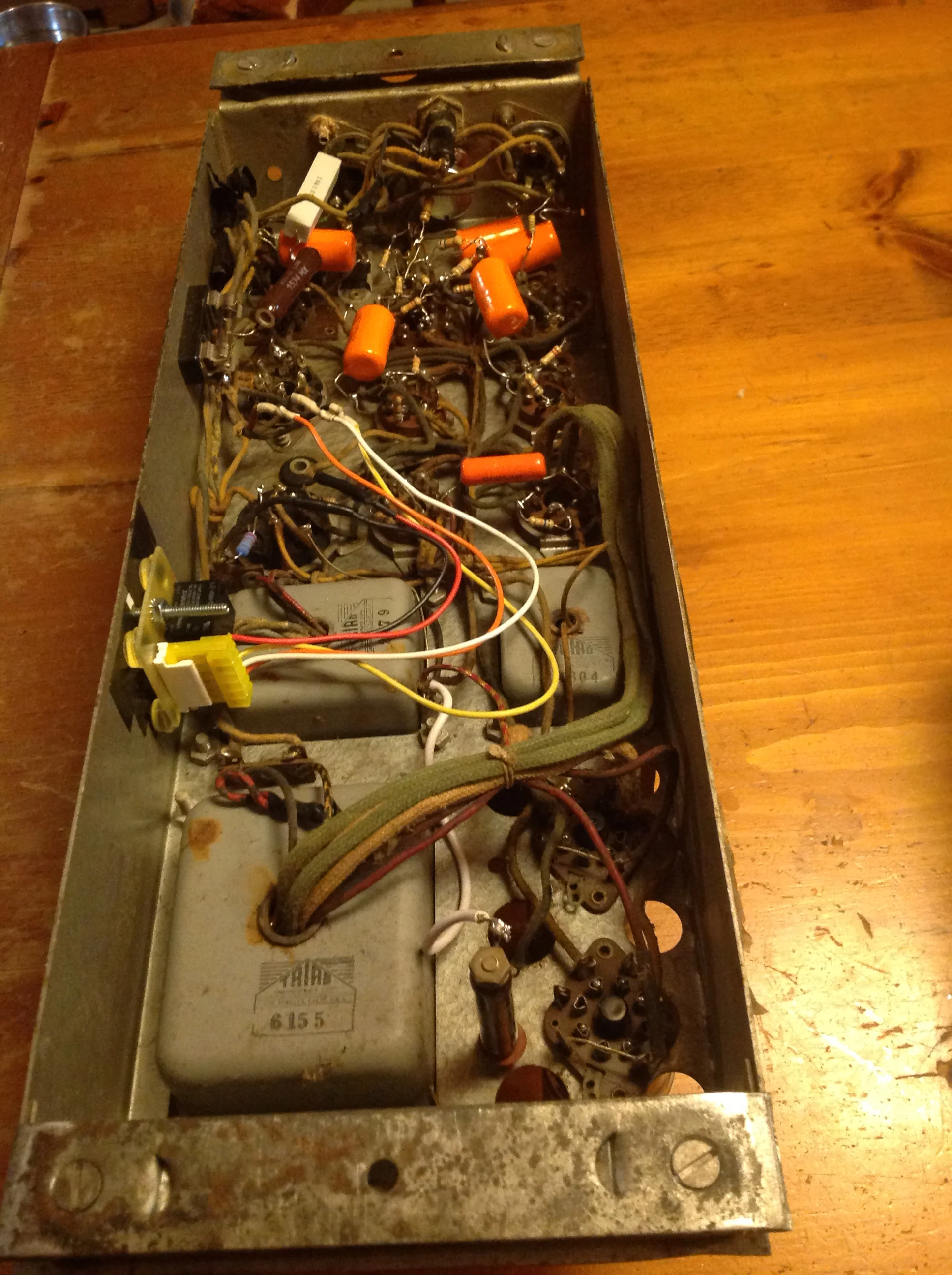 New capacitors, resistors, and relay installed, wiring restored to standard configuration.