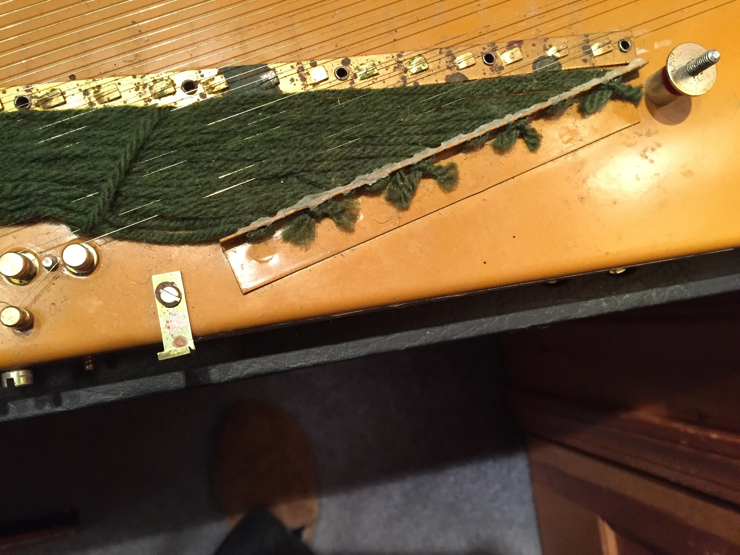 You can see some corrosion where the hammers strike the strings.