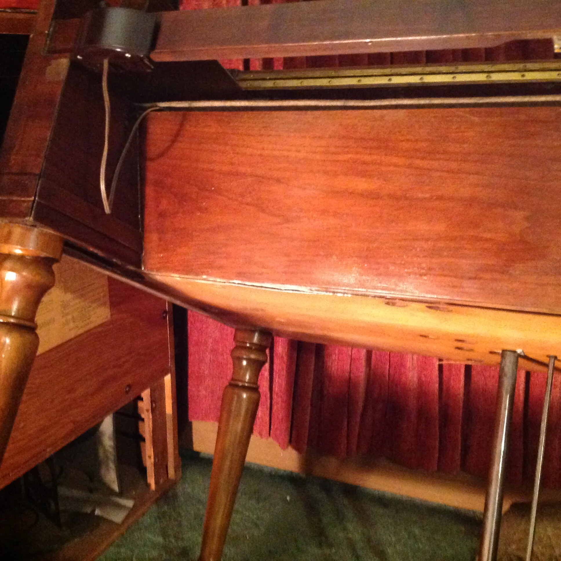 The front bottom panel was reattached with glue and small brads.
