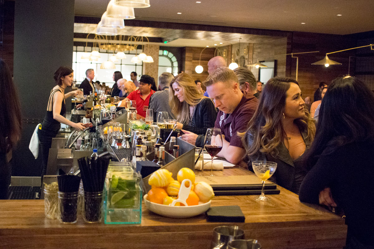 The lively bar at Lionfish in San Diego inside the Pendry Hotel