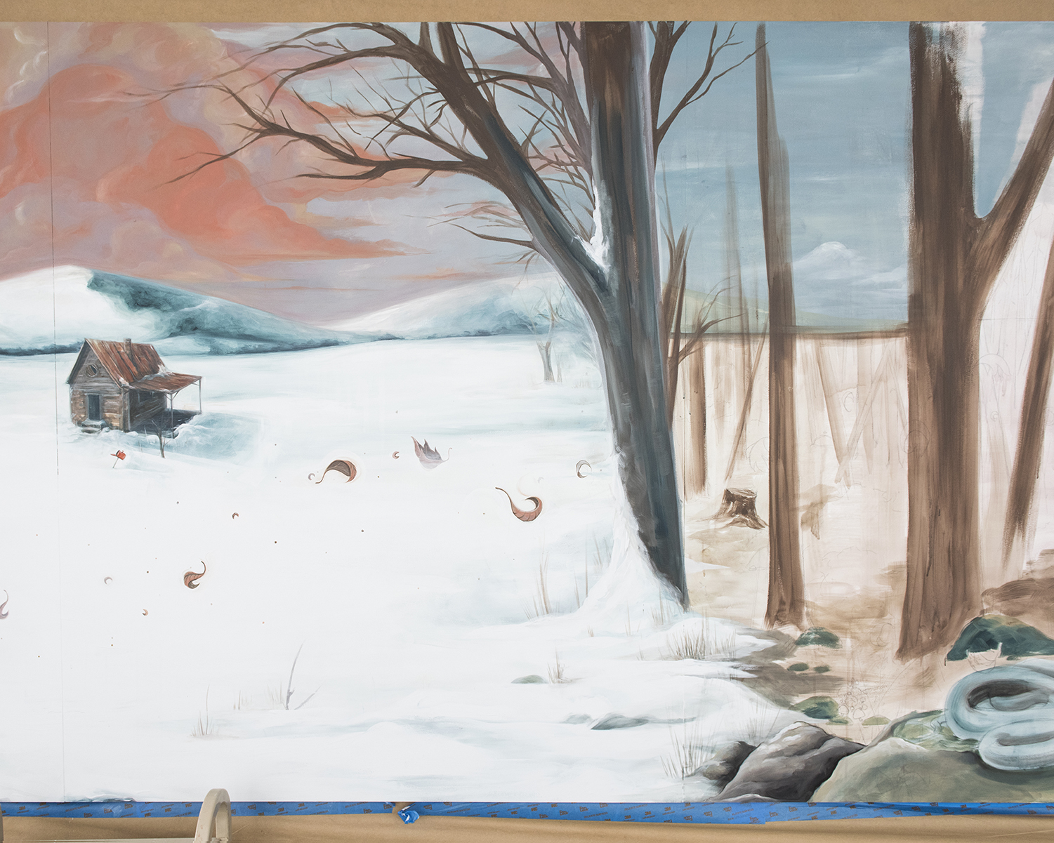 Finished cabin and sky on the left. Underpainting on trees to the right.