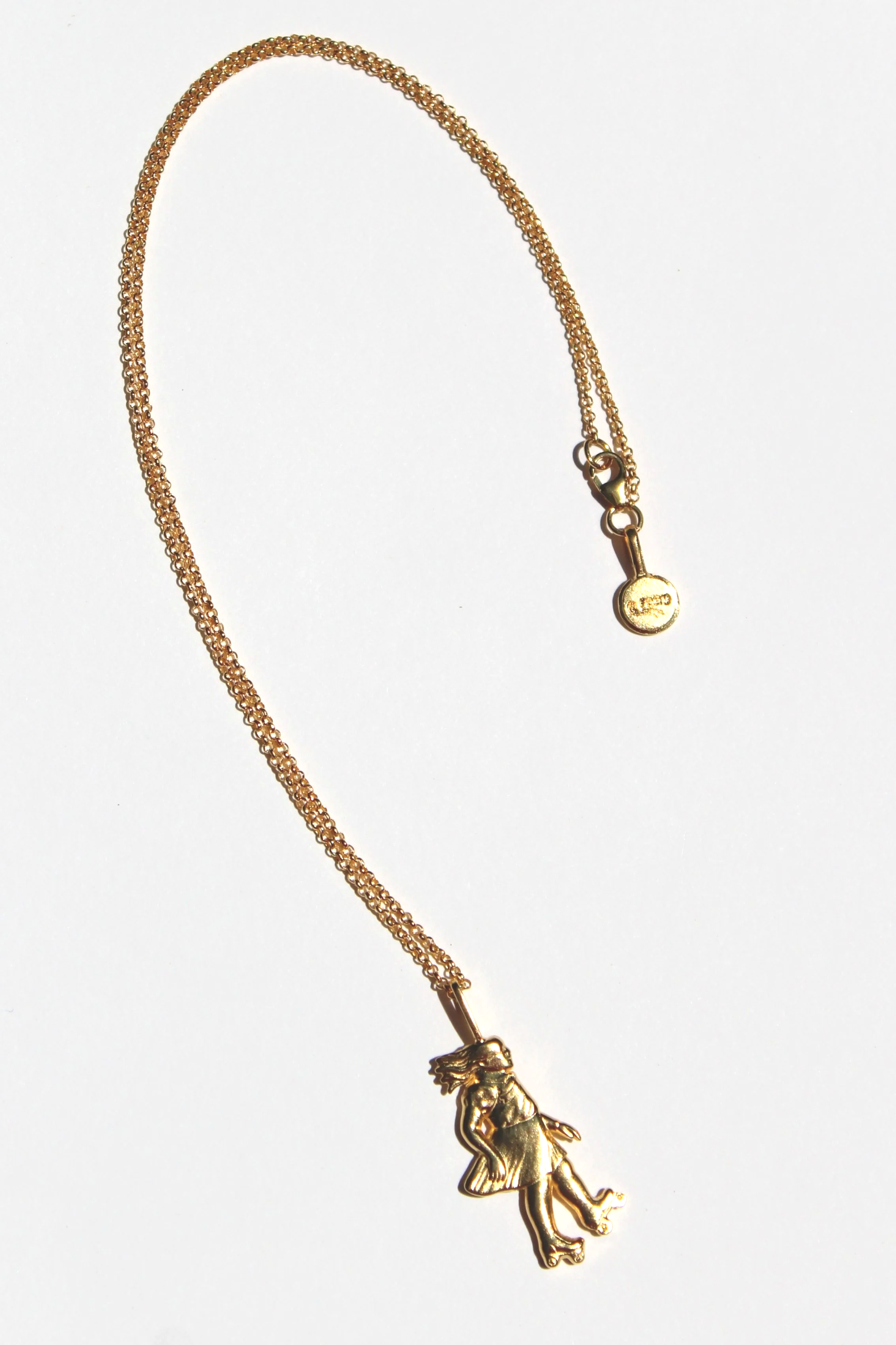 Skating girl charm on 18" chain