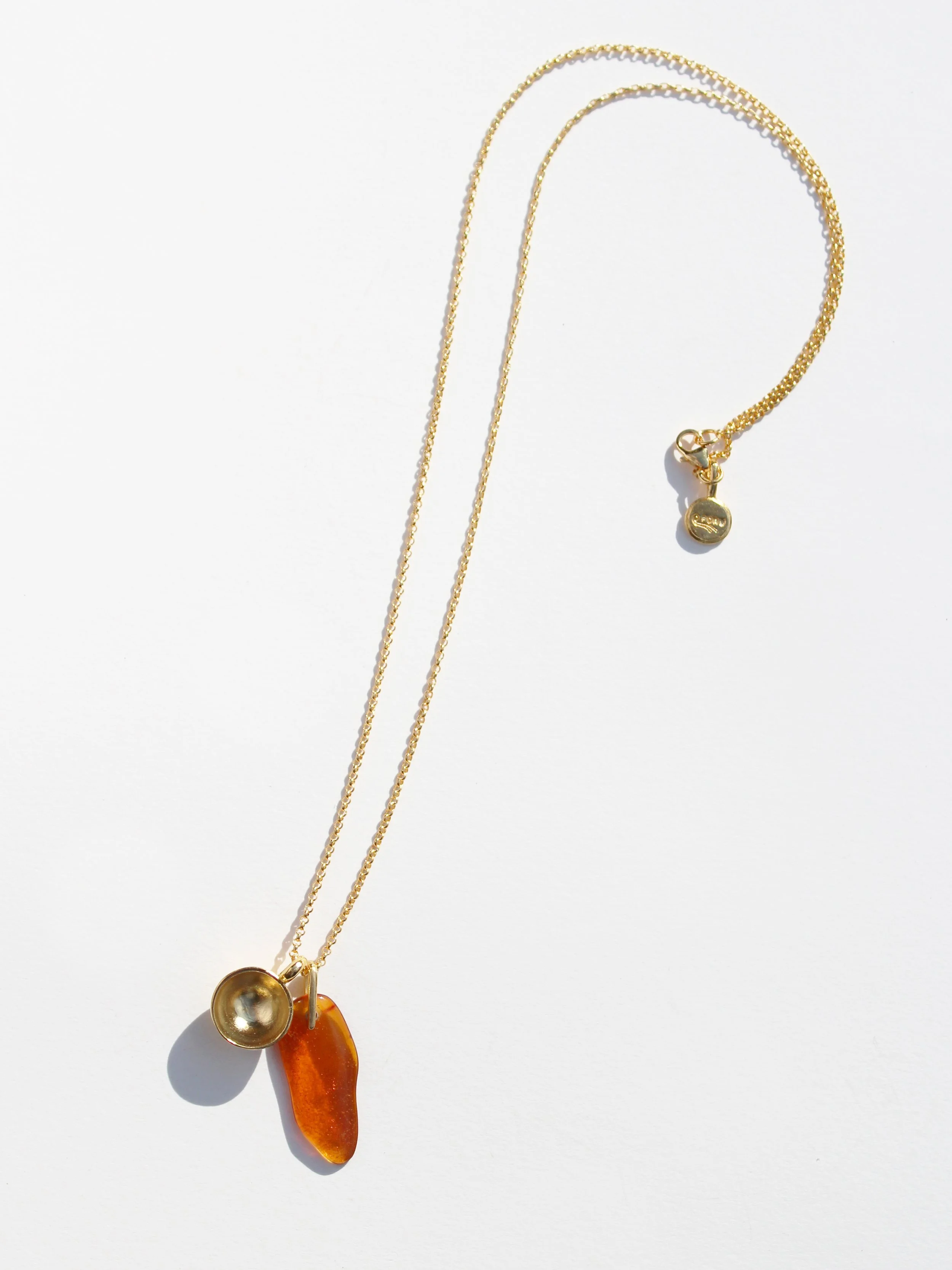 Amber Spilled tea & teacup charms on 22" chain