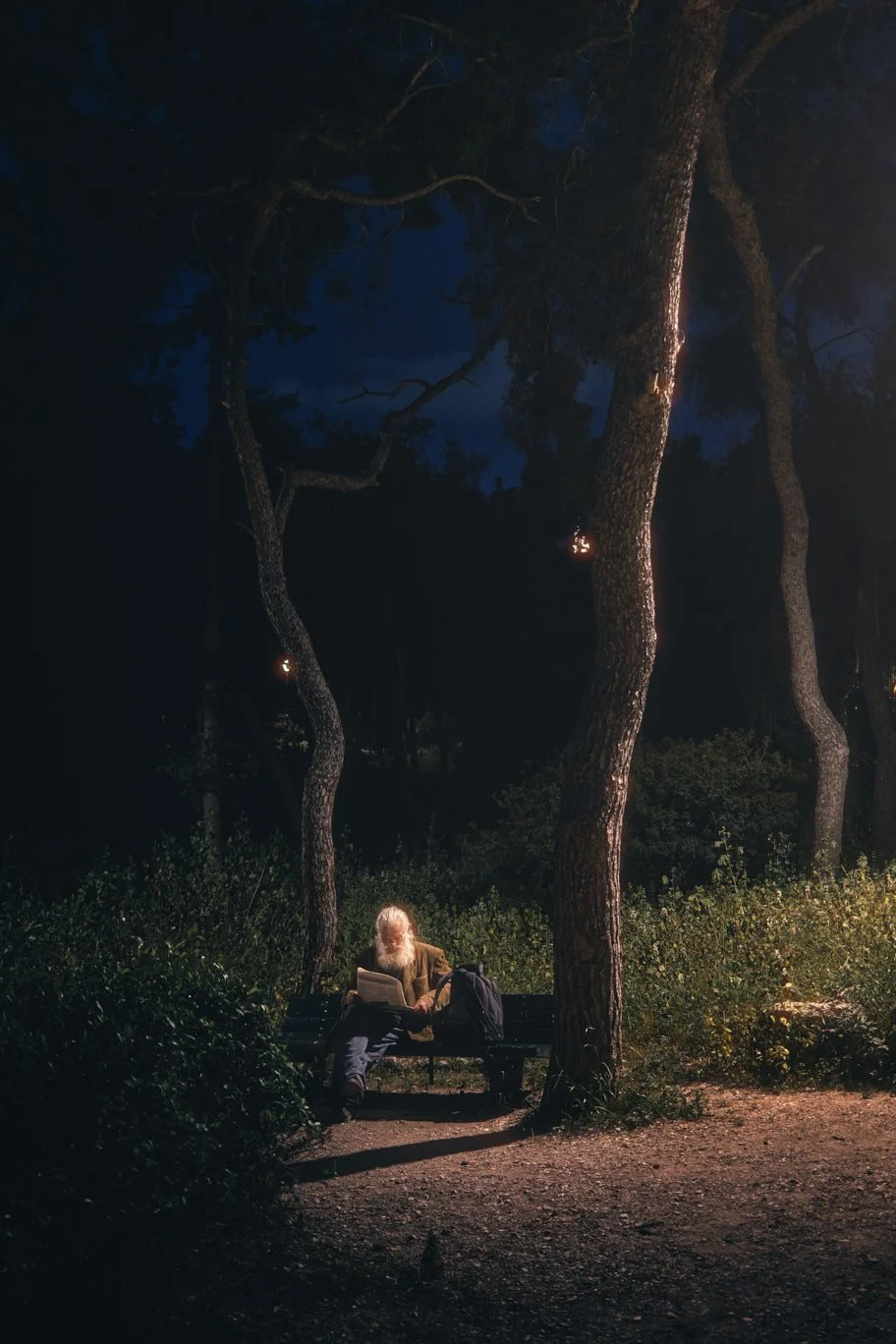 park-bench-reader-night-scene-philopappos-hill-athens-travel-photographer-miami.jpg