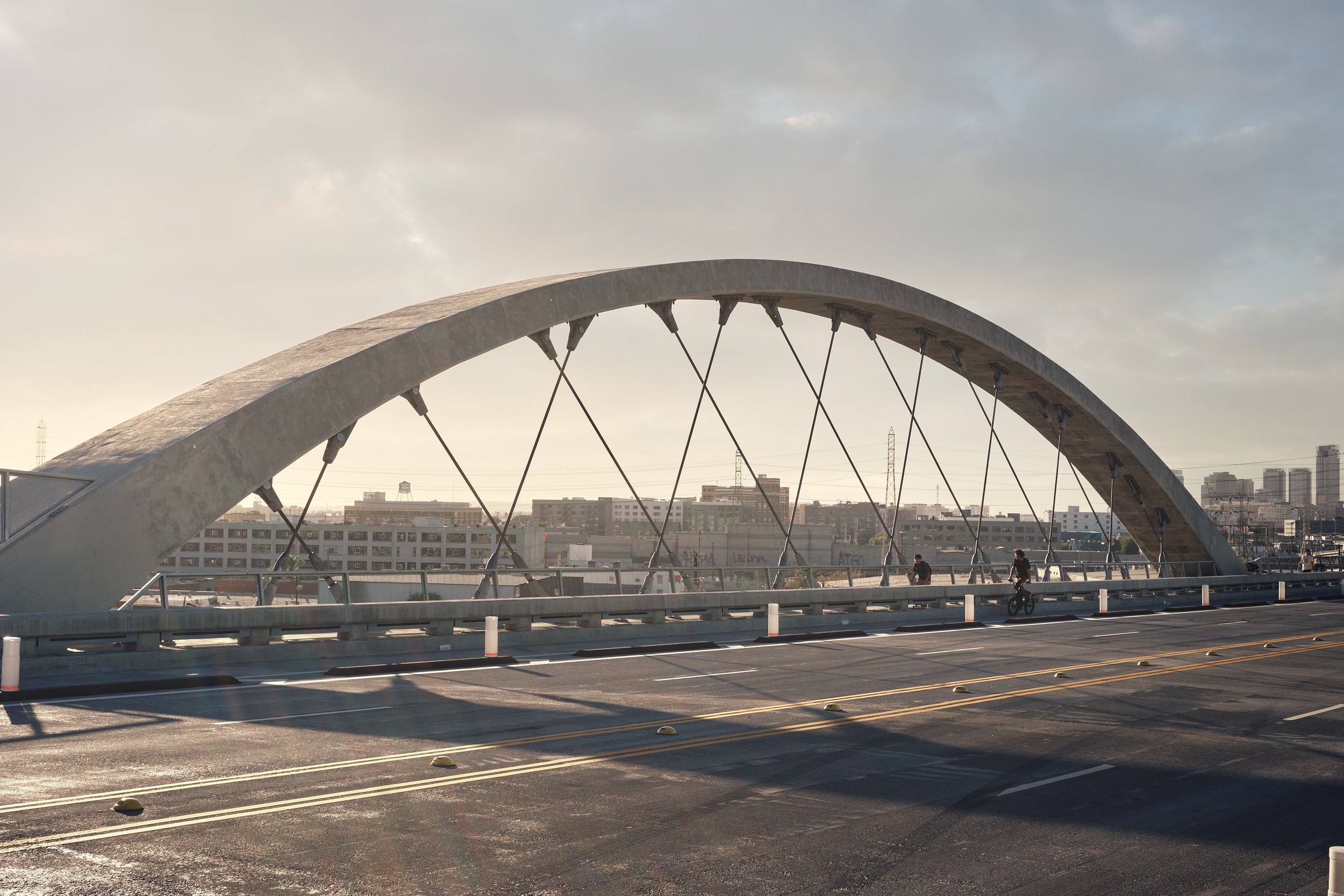 People cycling on the 6th street viaduct bridge in Los Angeles, California