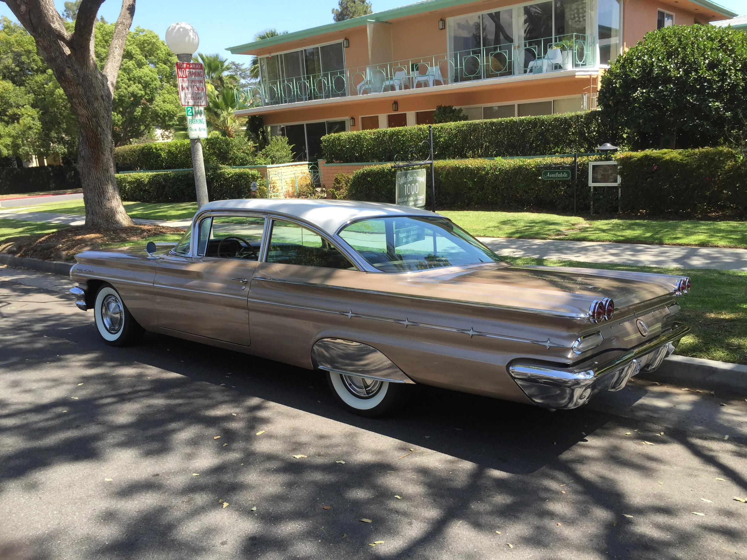 Don't you want to put on some Bermuda shorts and aviator sunglasses when you see this? Don Draper would be right at home behind the wheel. Betty, can you bring me a martini?