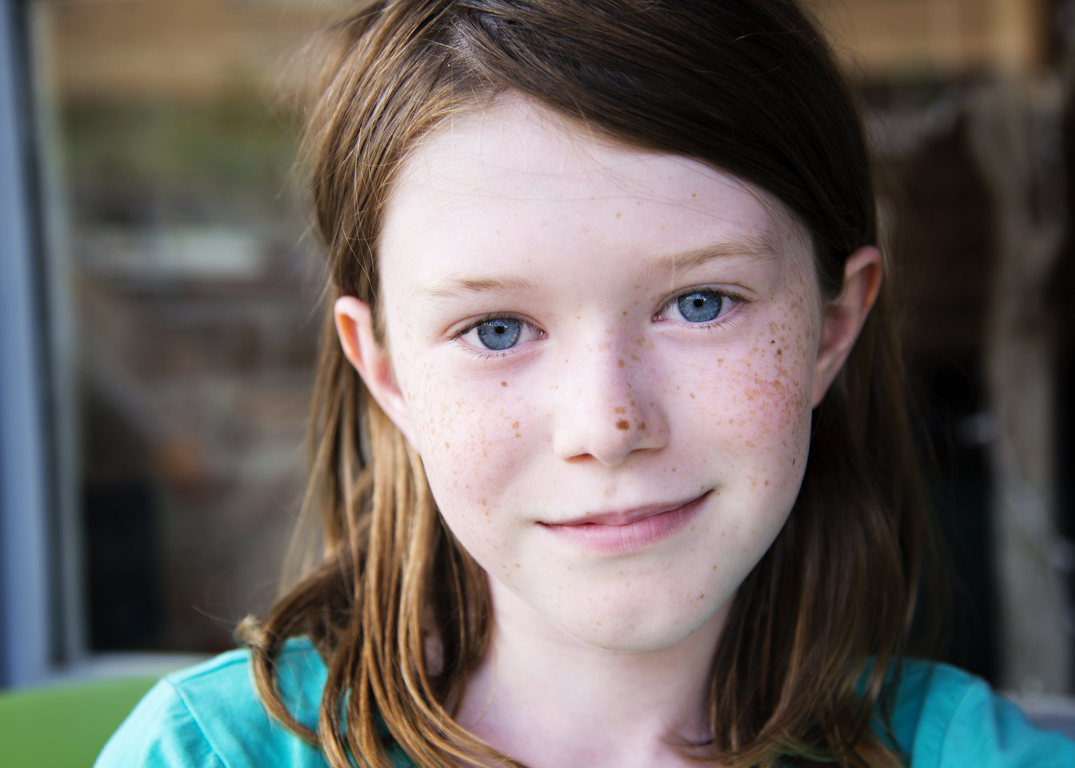 Samantha having ice cream in Durango, Colorado. Nikon D800, 24-120mm lens, ISO 160, f4.5, 1/160 sec. 