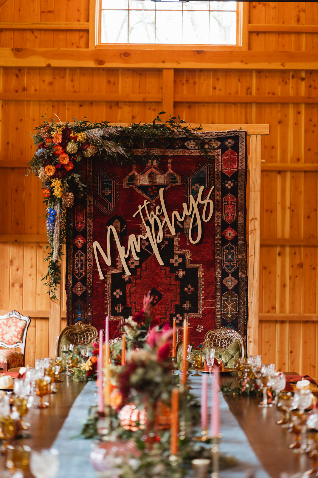 barn-wedding-vintage-rug-backdrop.jpg