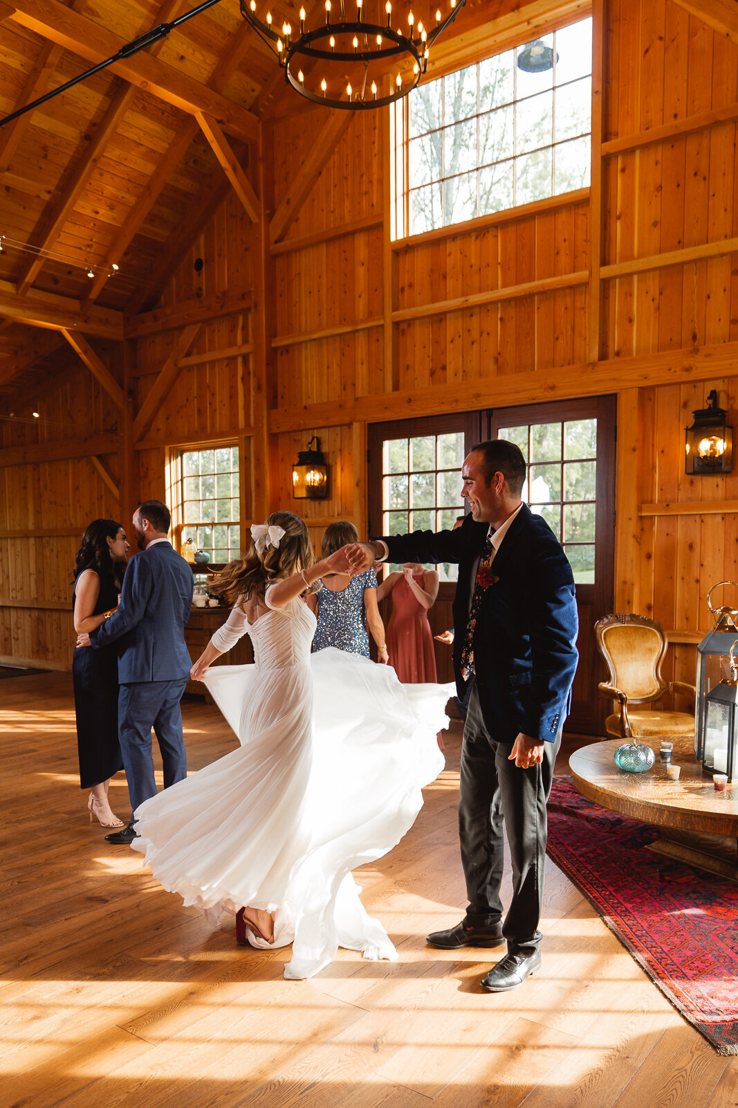bride-groom-dancing-barn.jpg