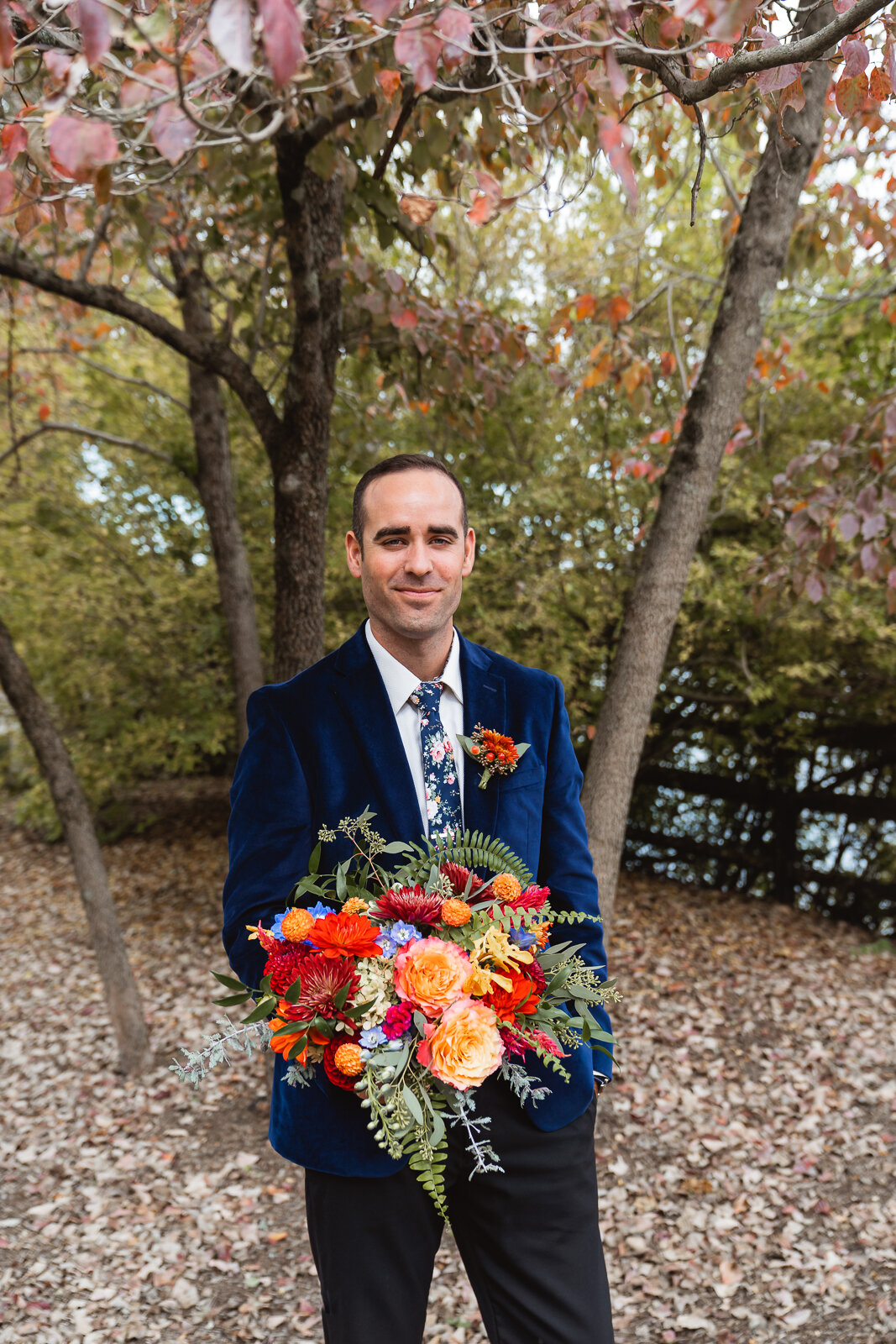 groom-holding-bouquet.jpg