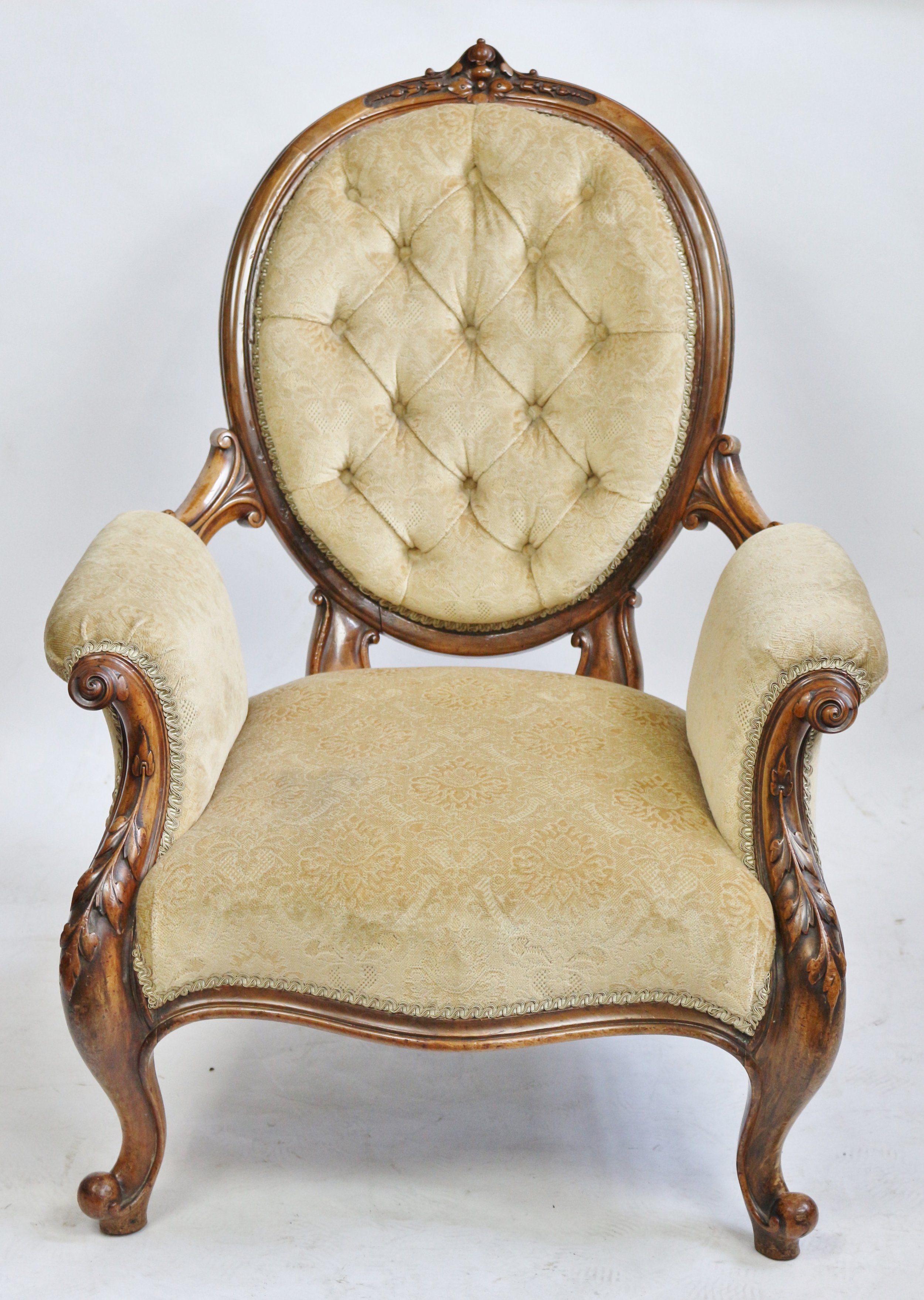 victorian walnut button back armchair on cabriole legs