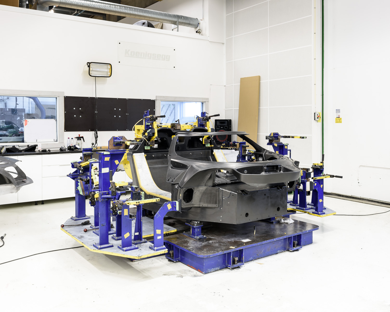  The start of the production line where the five main carbon fibre parts of the chassis are bonded together. 