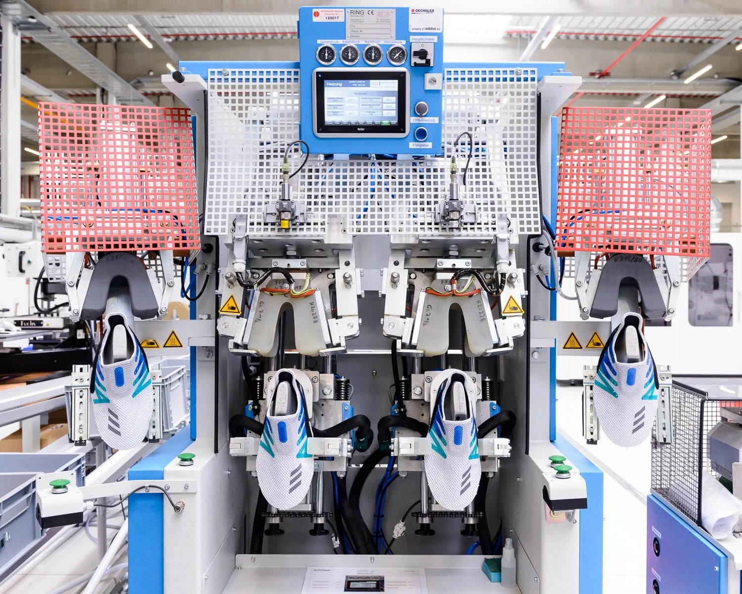 adidas Made for London shoes in a lasting machine the company's new "Speedfactory" in Bavaria.
