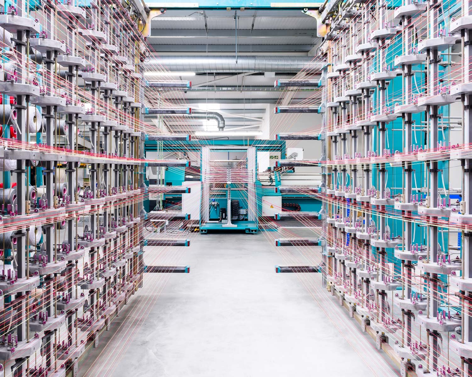 Creel full of yarn making a warp at Wooltex textile mill, Kvadrat, United Kingdom, 2016