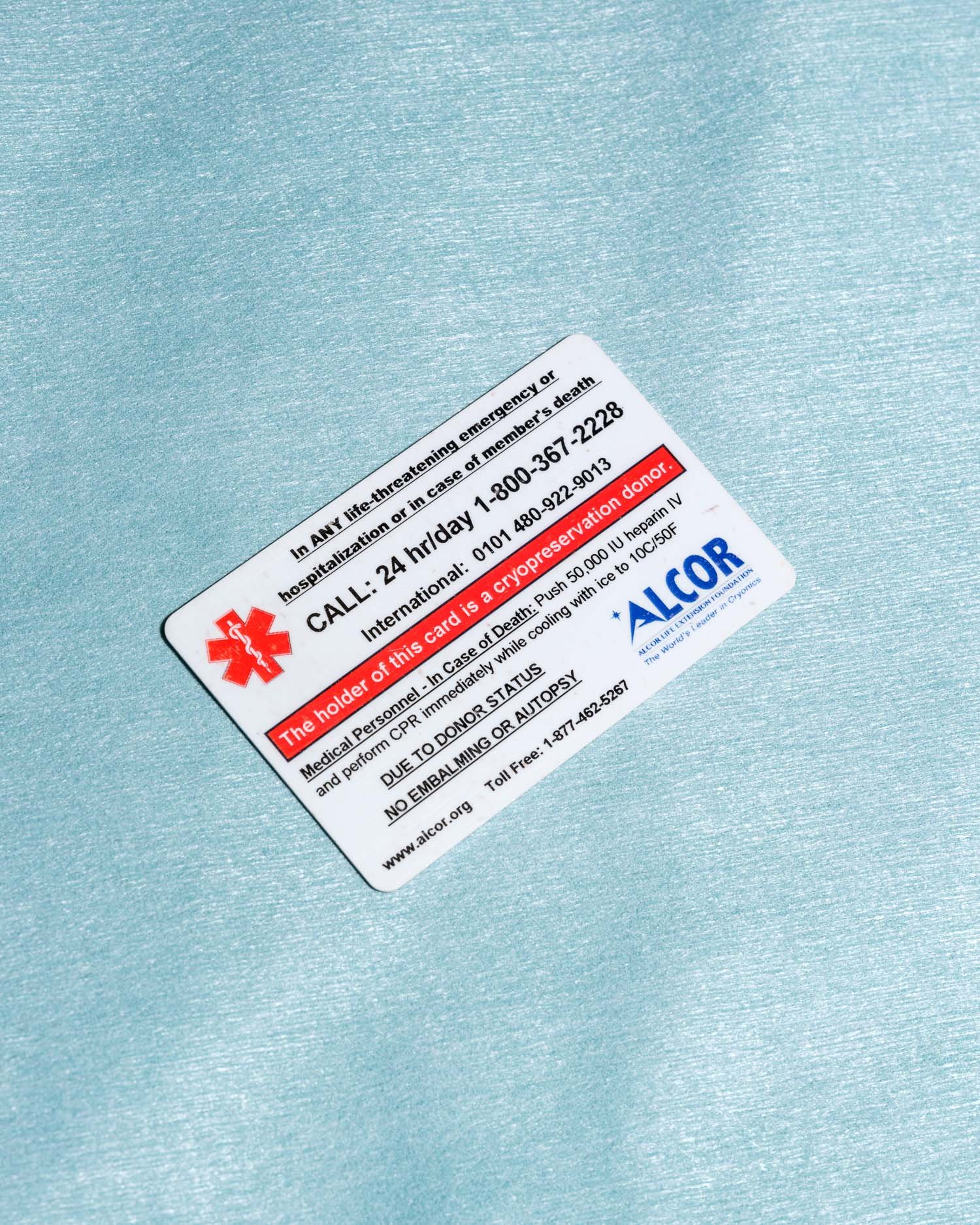  An Alcor membership card, which contains information about what to do upon death. Alcor has teams around the world ready to take over care of a body upon death. 