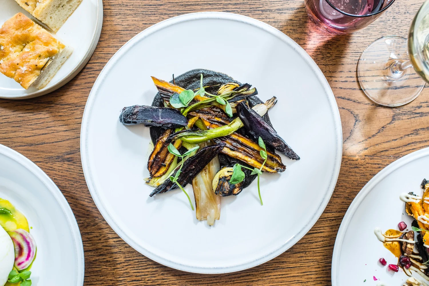 Burnt onions with charred courgettes and garlic yogurt