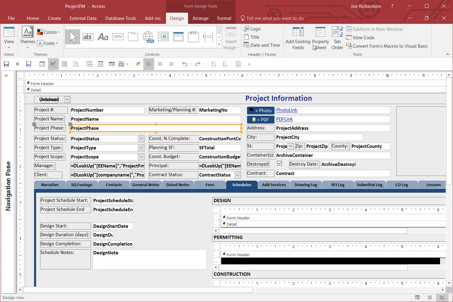 An access database form in design view with fields, tabs and buttons