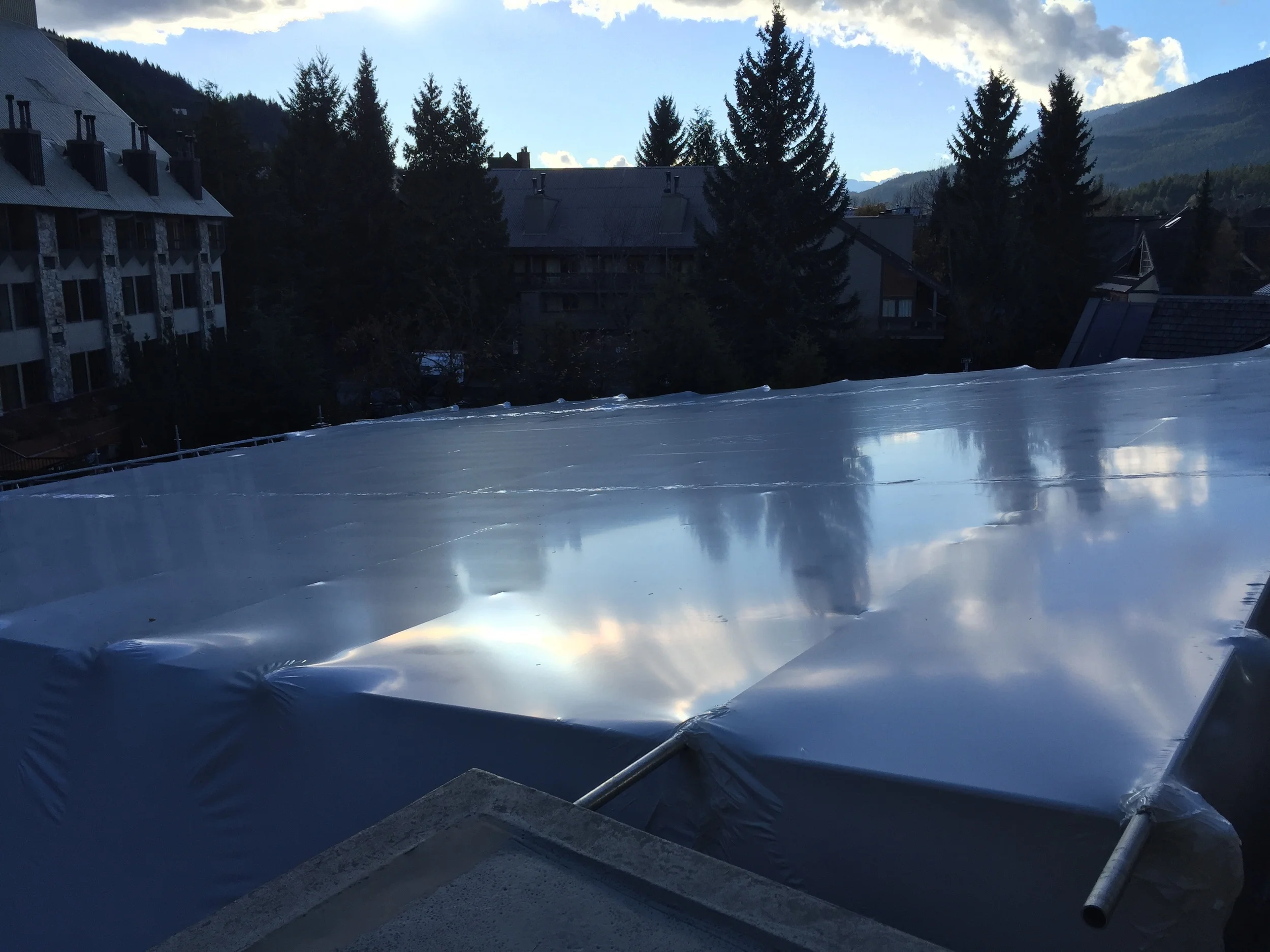 Rhino Wrap has mastered Shrinking flat roofs from ontop instead of below.
