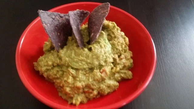Super quick and easy! This guacamole makes a great dip, sandwich spread, addition to salads or as a condiment atop baked potatoes!