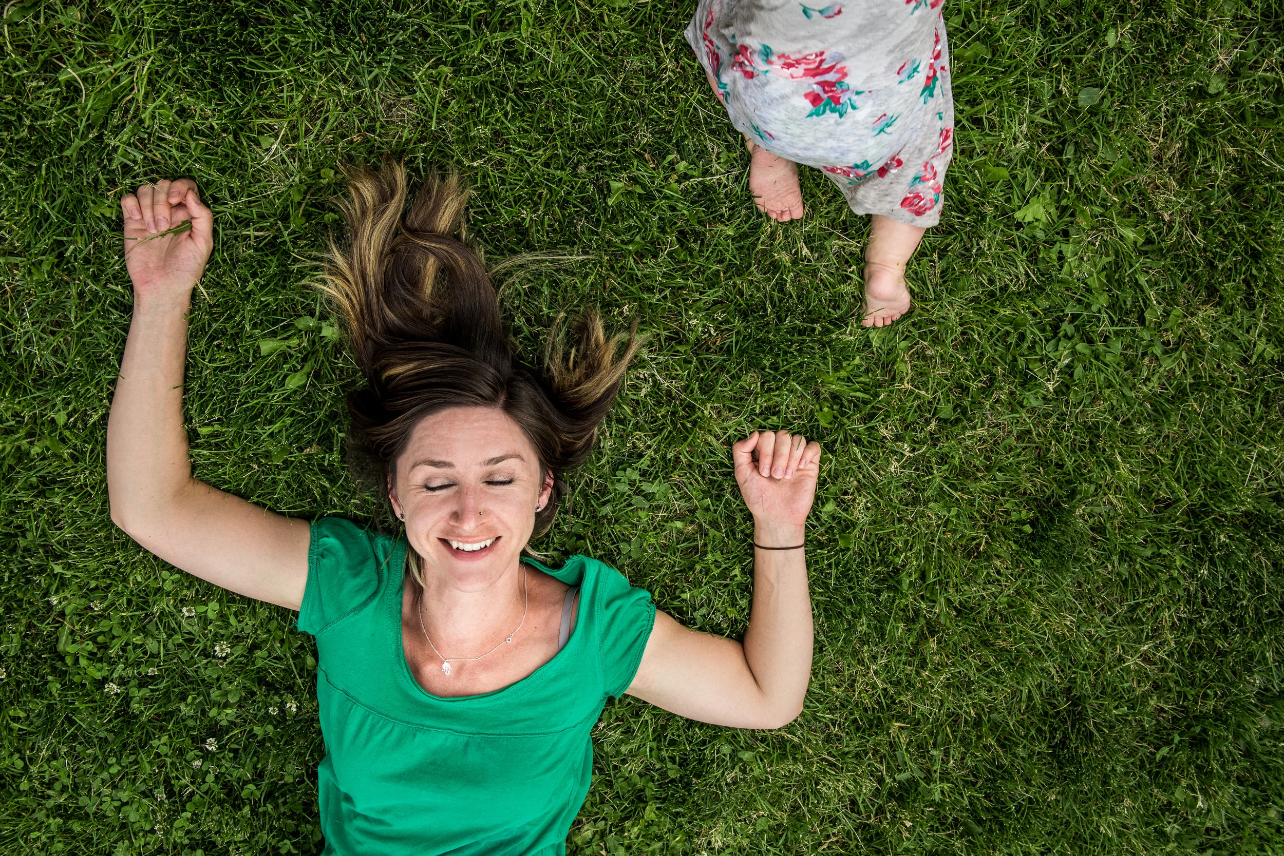 Blog - The Pen & Camera - Gratitude Journal, Inspirational, Friendship, Motherhood, Writing, Denver, Colorado - Molly Rees Photo - Documentary Childhood Photography - mom laying on grass with crawling baby by M. Menschel