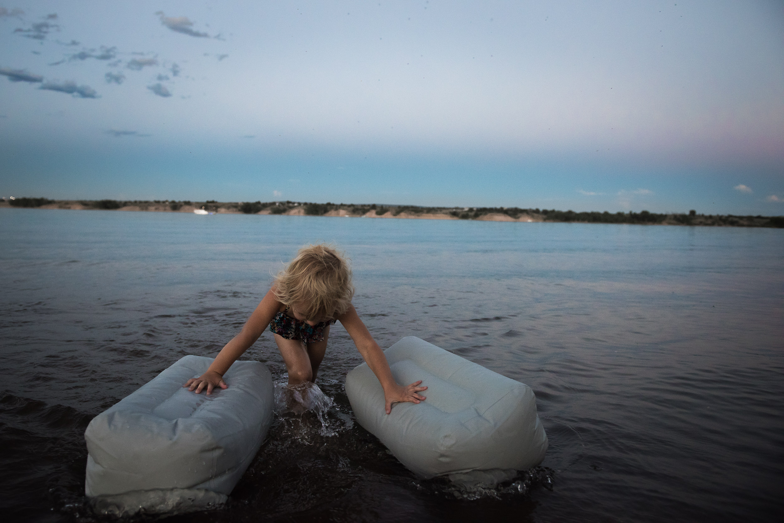 Blog - The Pen & Camera - Molly Rees Photo - Documentary Childhood Photography - girl at night in water at Chatfield Reservoir in Denver, Colorado by M. Menschel