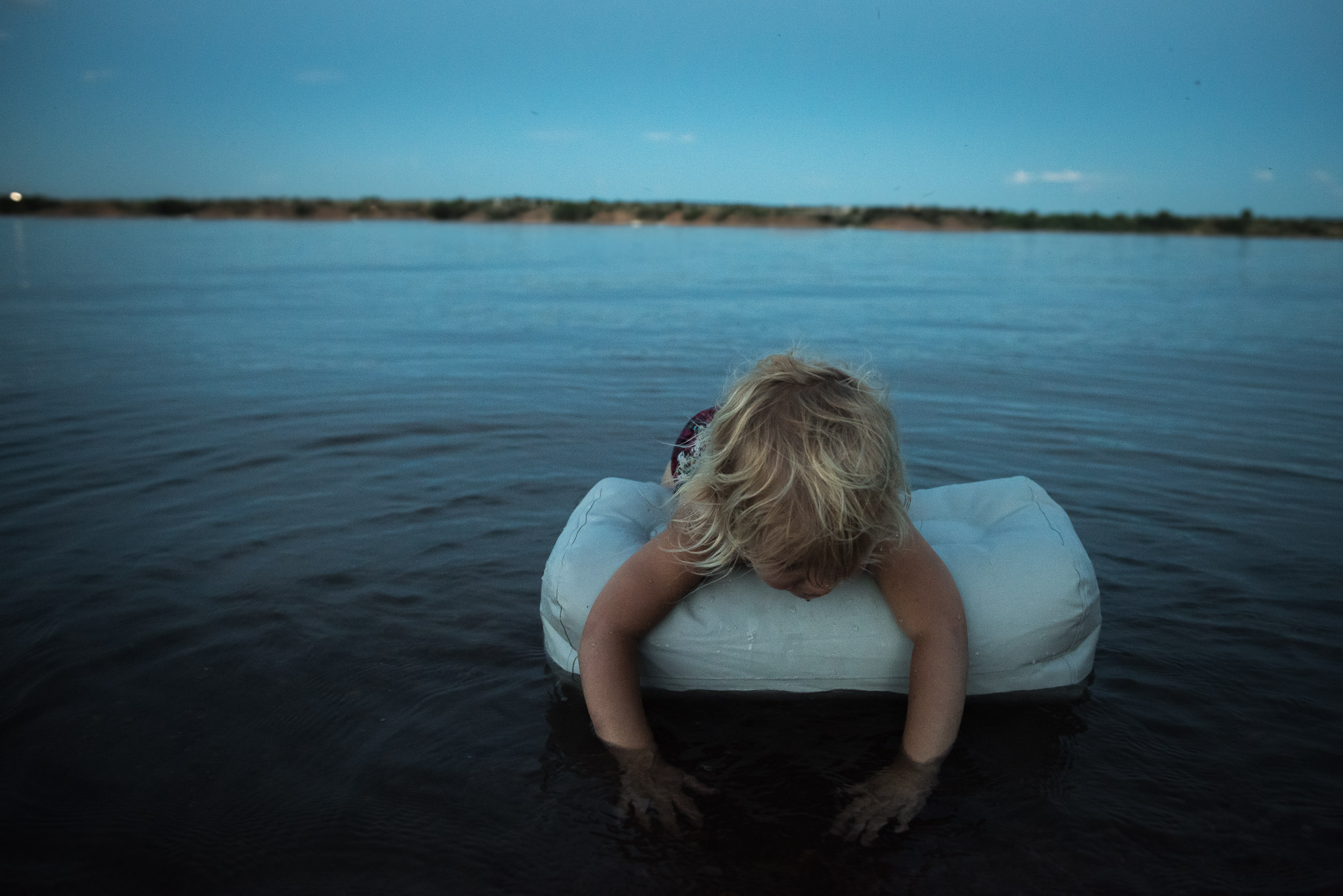 Blog - The Pen & Camera - Molly Rees Photo - Documentary Childhood Photography - girl at night in water at Chatfield Reservoir in Denver, Colorado by M. Menschel