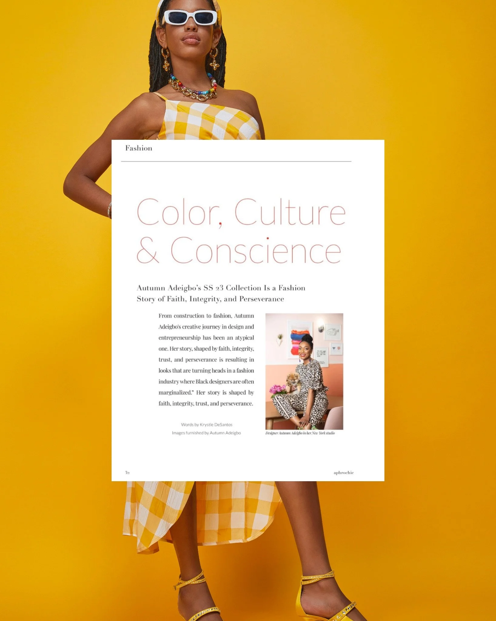A woman with dark skin and dreadlocks wearing yellow and white checkered dress, yellow high heels, white sunglasses, colorful jewelry, and standing against a yellow background. She is holding a magazine or brochure with a fashion article in front of her.
