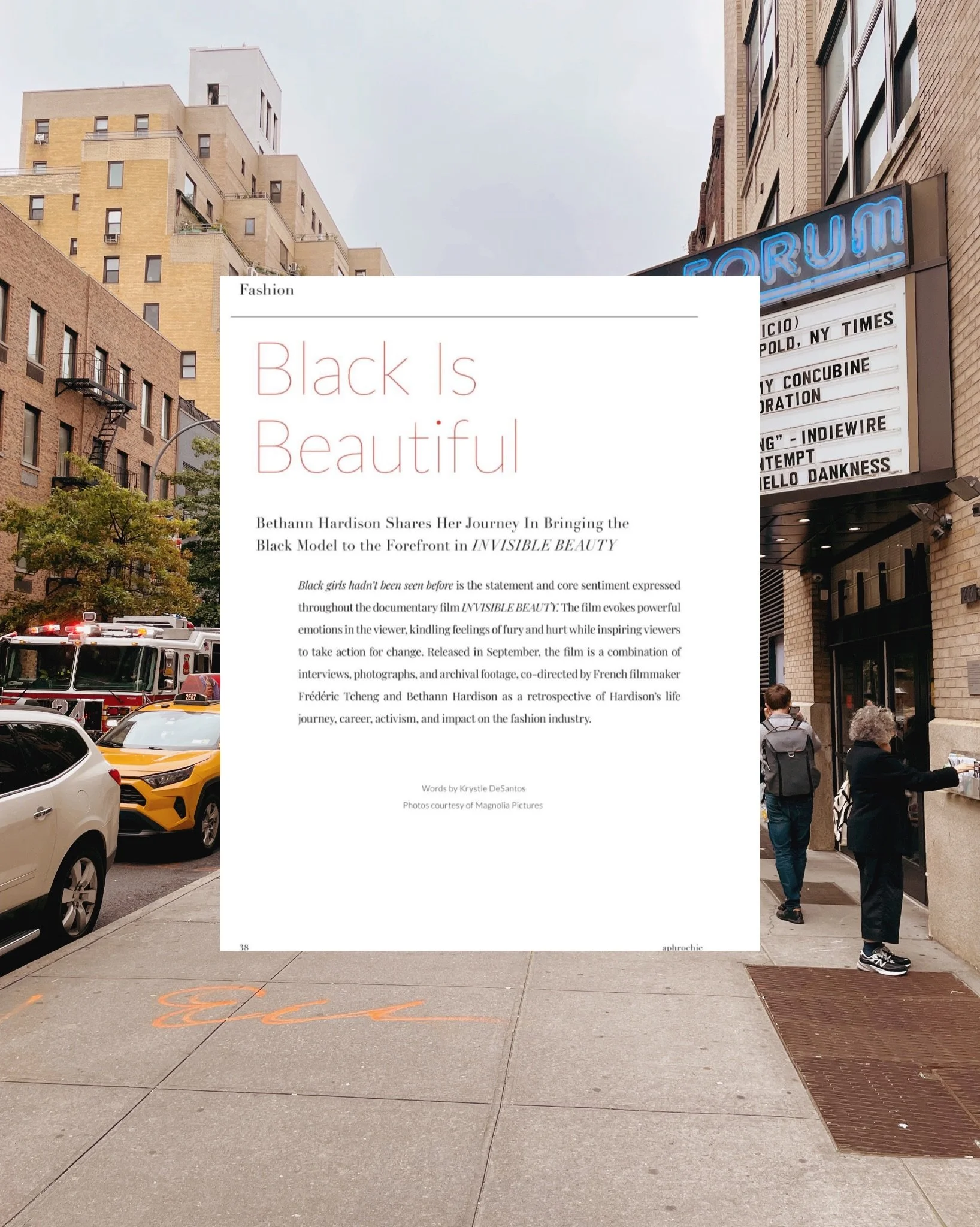 A magazine page titled 'Black Is Beautiful' overlaid on an urban street scene featuring parked cars, a storefront marquee, pedestrians, and buildings.