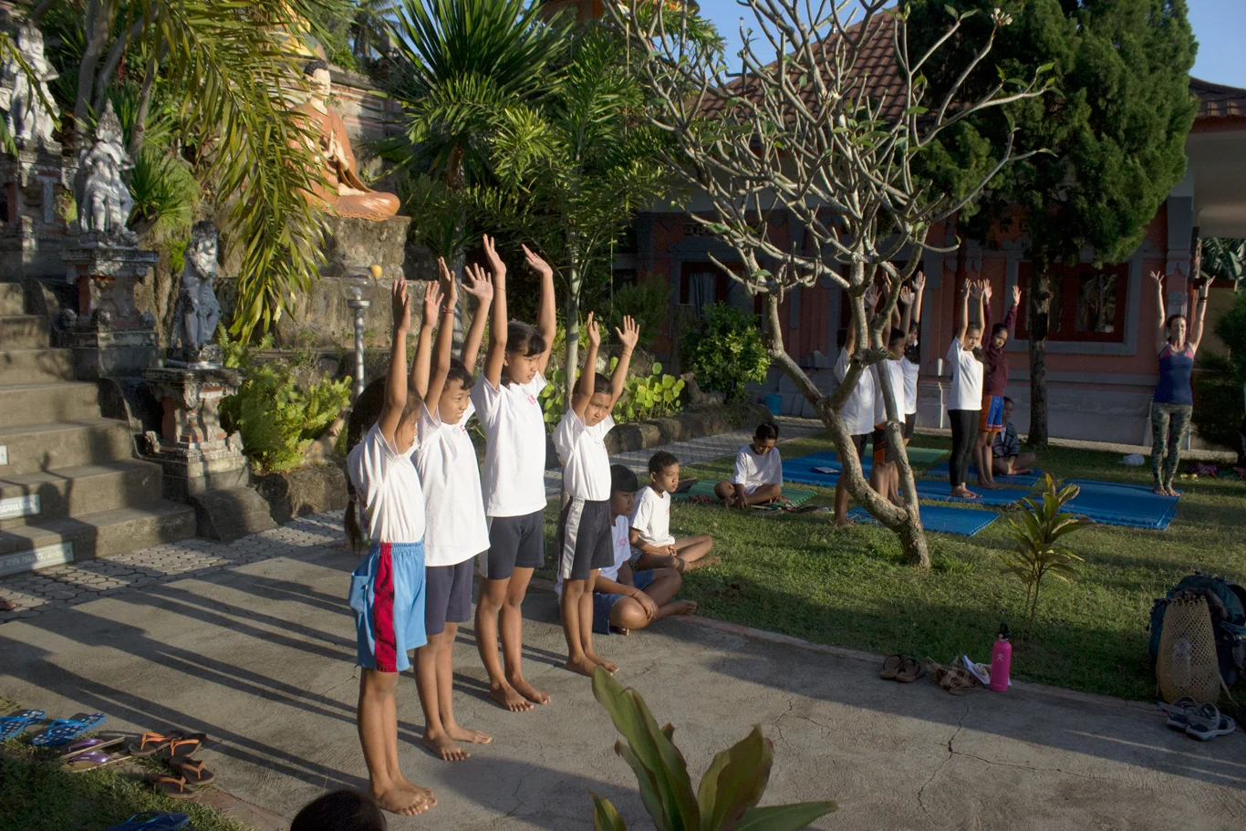 Bali Children Foundation youth practicing yoga at Let's Imagine Yoga Camp