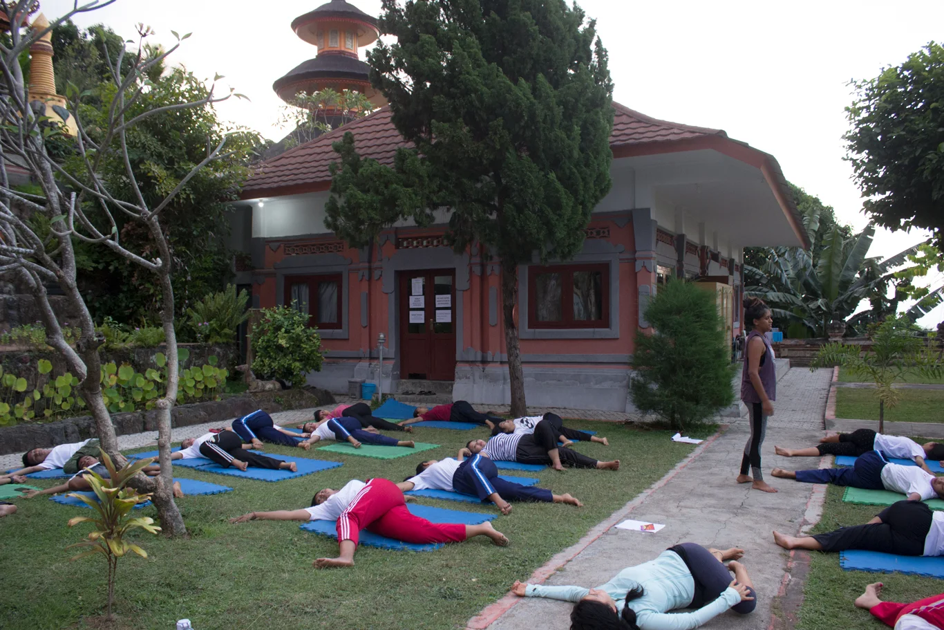 Supine Twist for cool down led by Volunteer Yoga Teacher Maggy