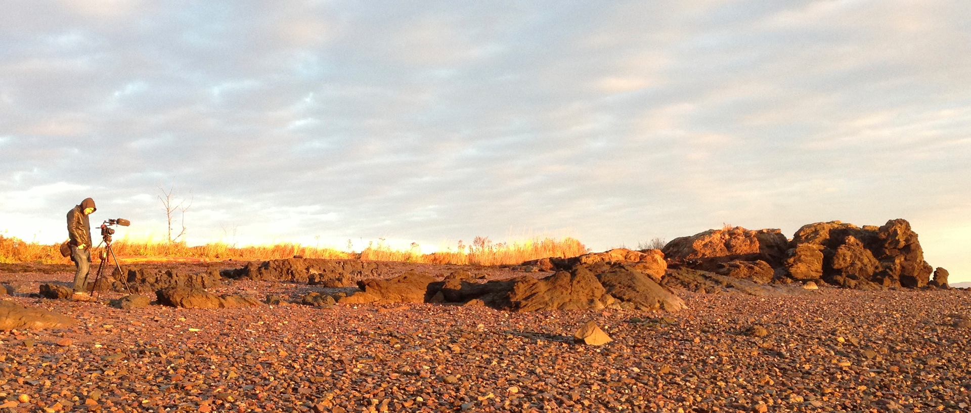 Dawnland Co-director Ben Pender-Cudlip at Split Rock in Sipayik, Maine