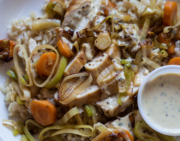 Chicken sauteed with leeks, carrots, tarragon, and dijon cream sauce