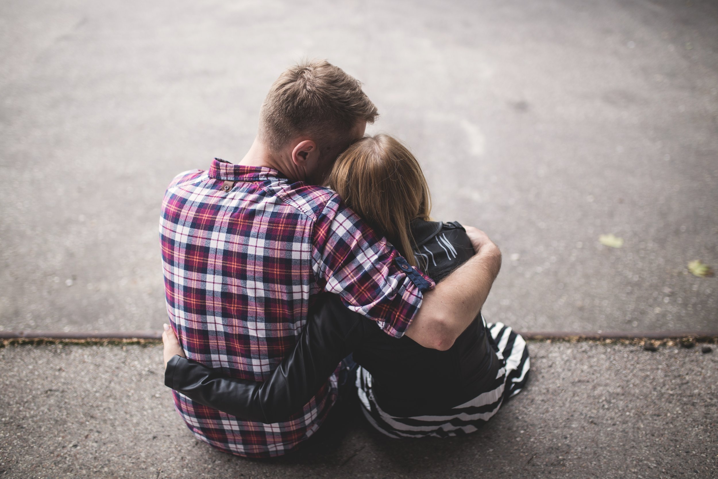 negative-space-young-couple-cuddling.jpg