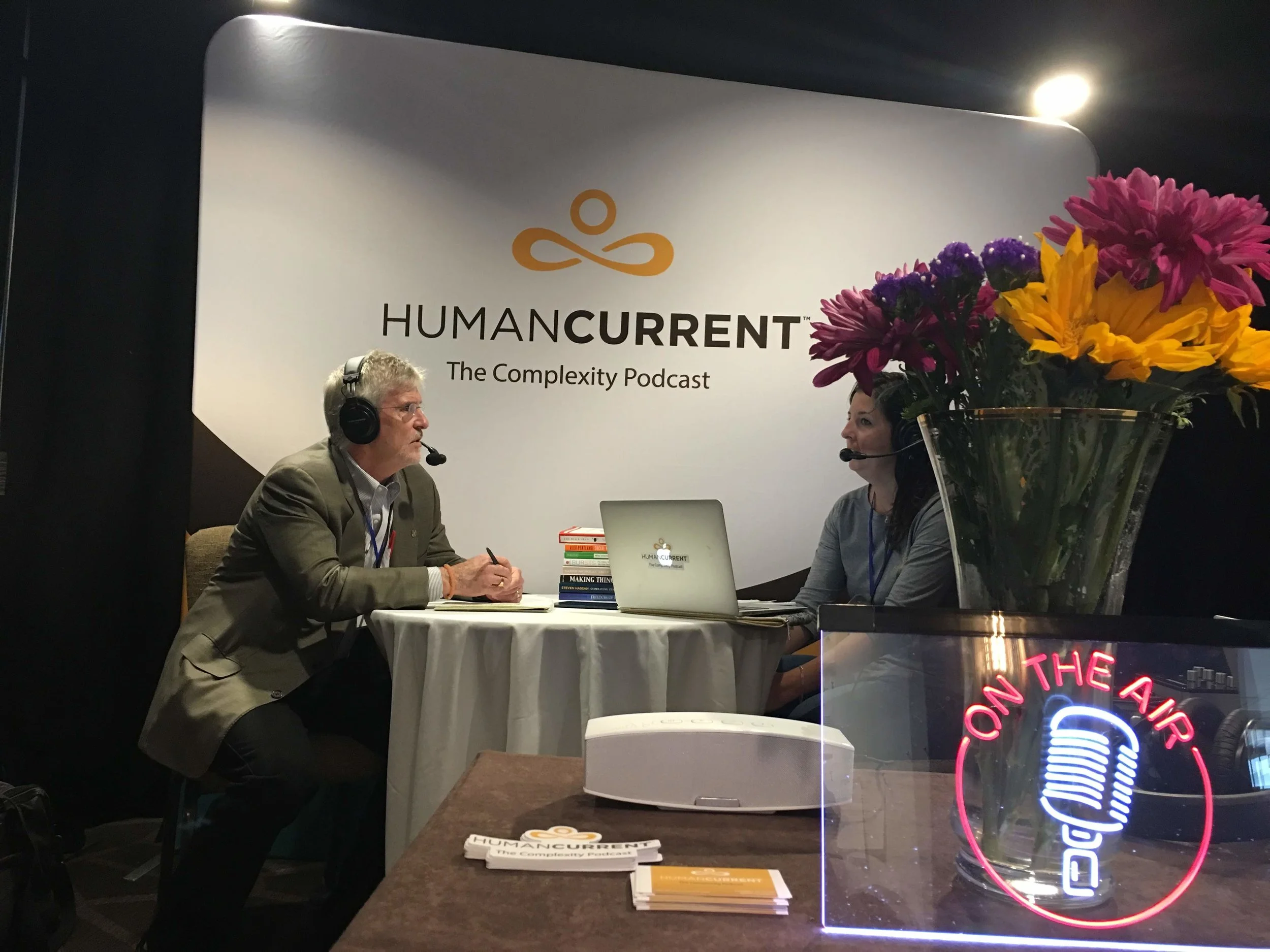 Haley talking with Professor Patrick McQuillan at ICCS 2018