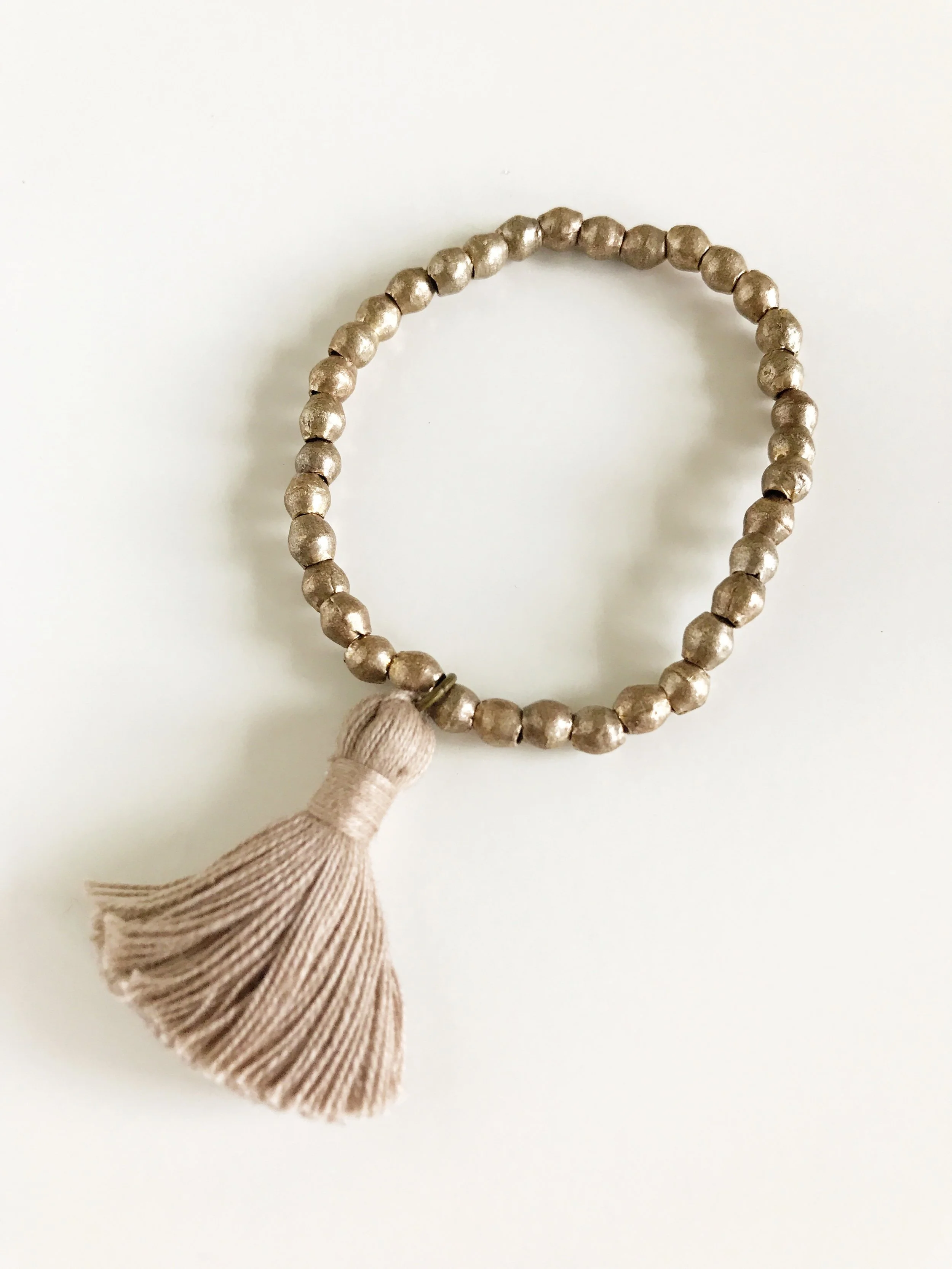silver trade beads with tassel