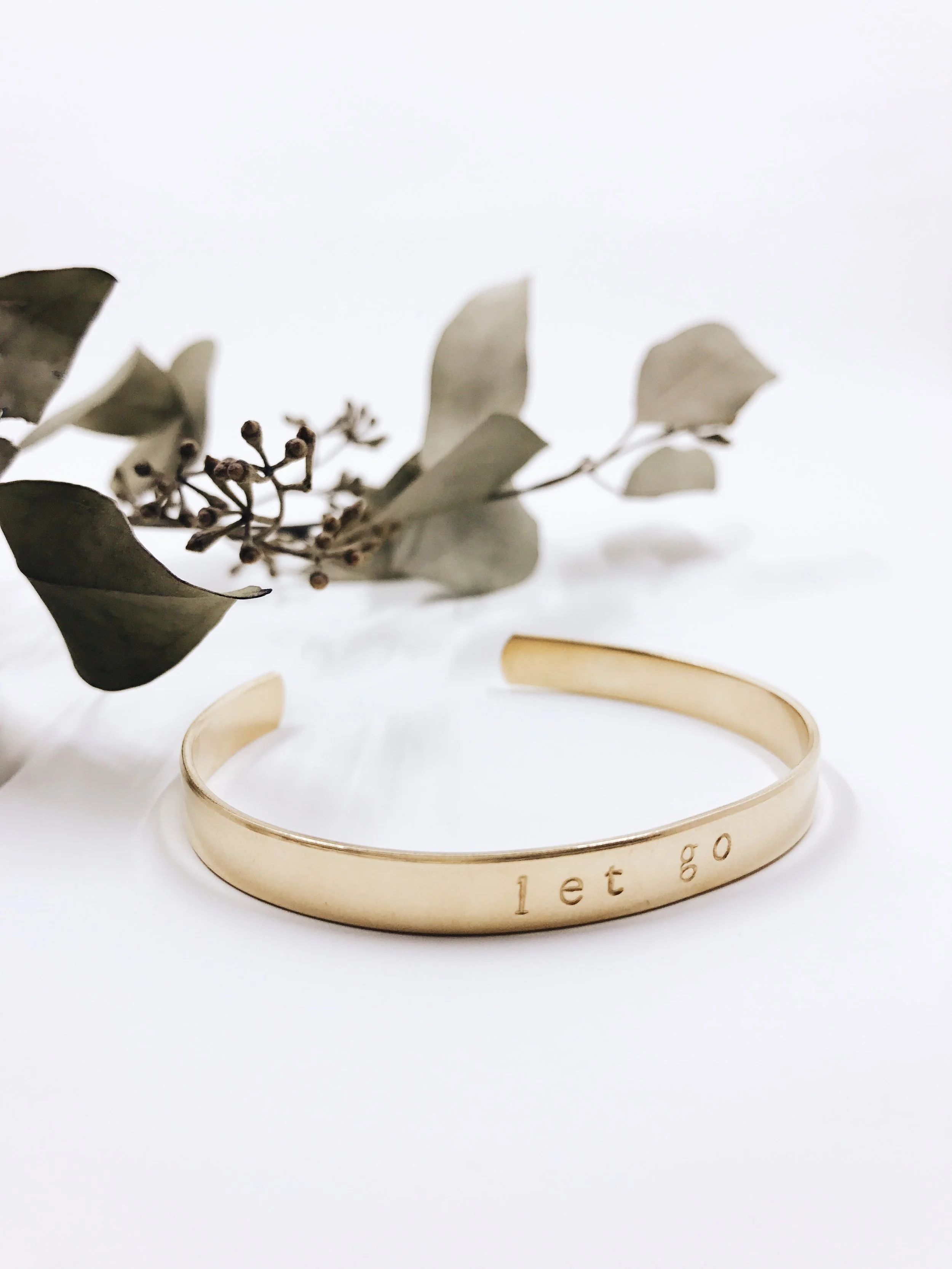 let go | hand stamped bangle