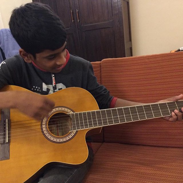 Future guitarist! Who cares if you&rsquo;re good when you&rsquo;re this cute? #childrestoration #hessocute #lovethelittleones #welovehim #growingupsofast #hesadorable #guitarist #futureguitarist