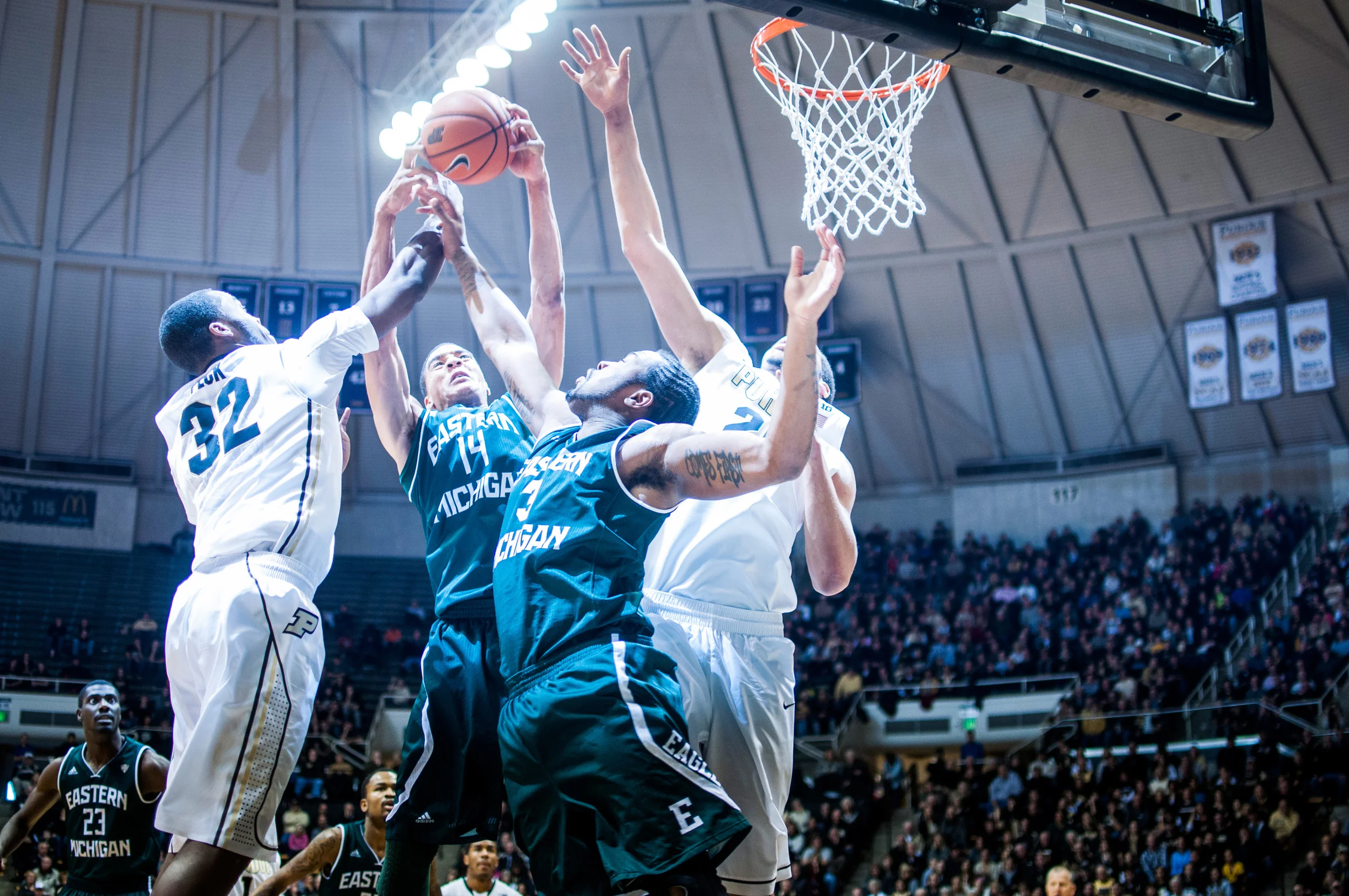 7_13-vs.-Eastern-Michiganm,-Errick-Peck,-A.J.-Hammons.jpg