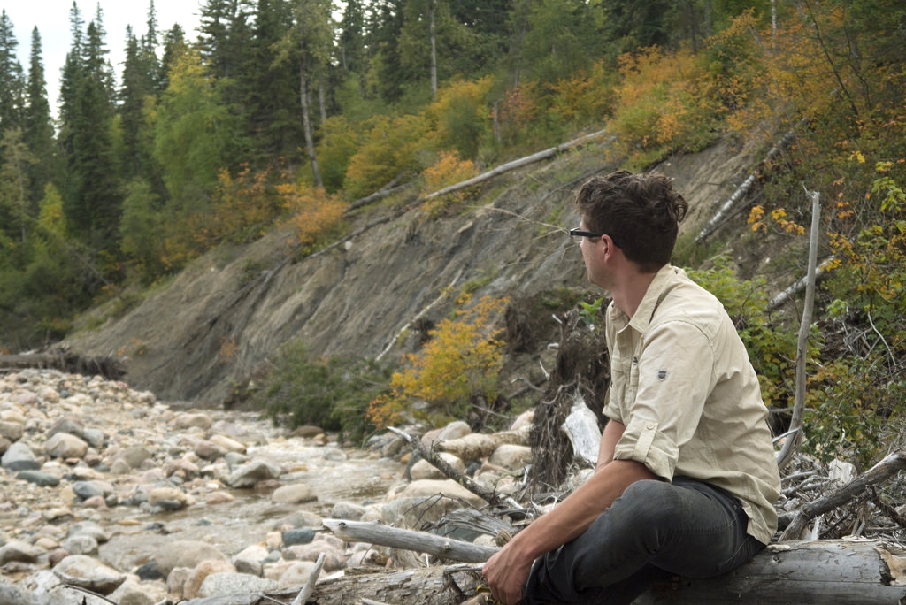 Mitch untying his boots on the plateau where we staked our camp.