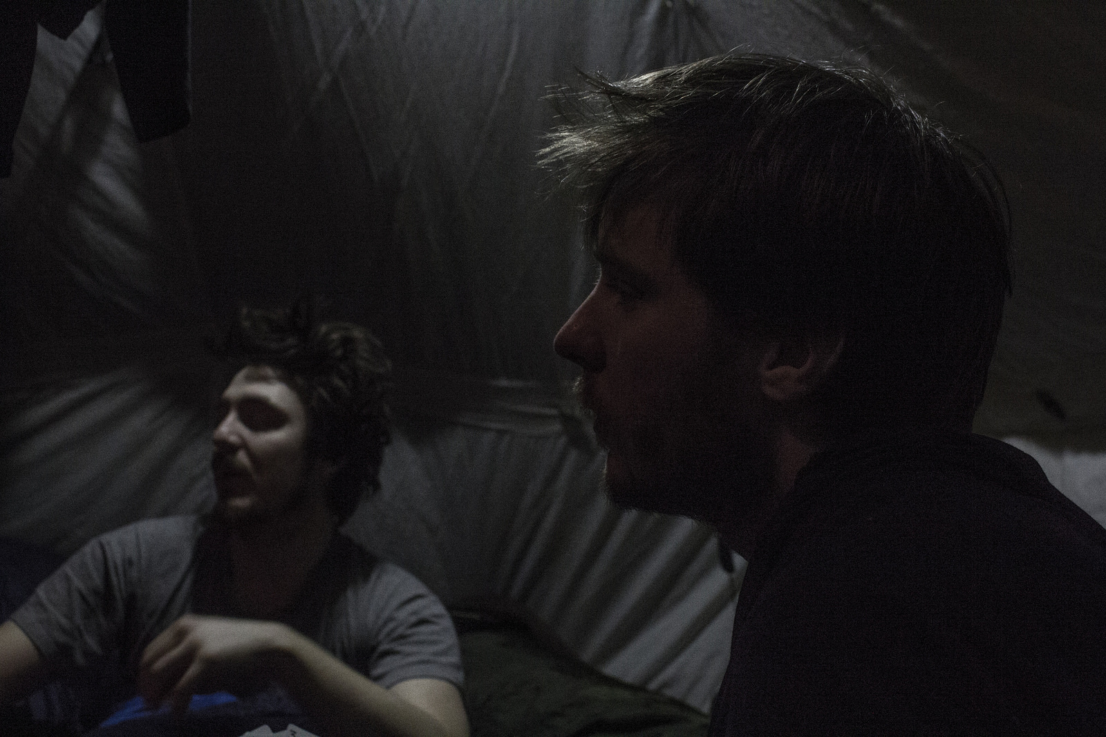 Playing a game of Kaiser in the tent before one last sleep on the ice.