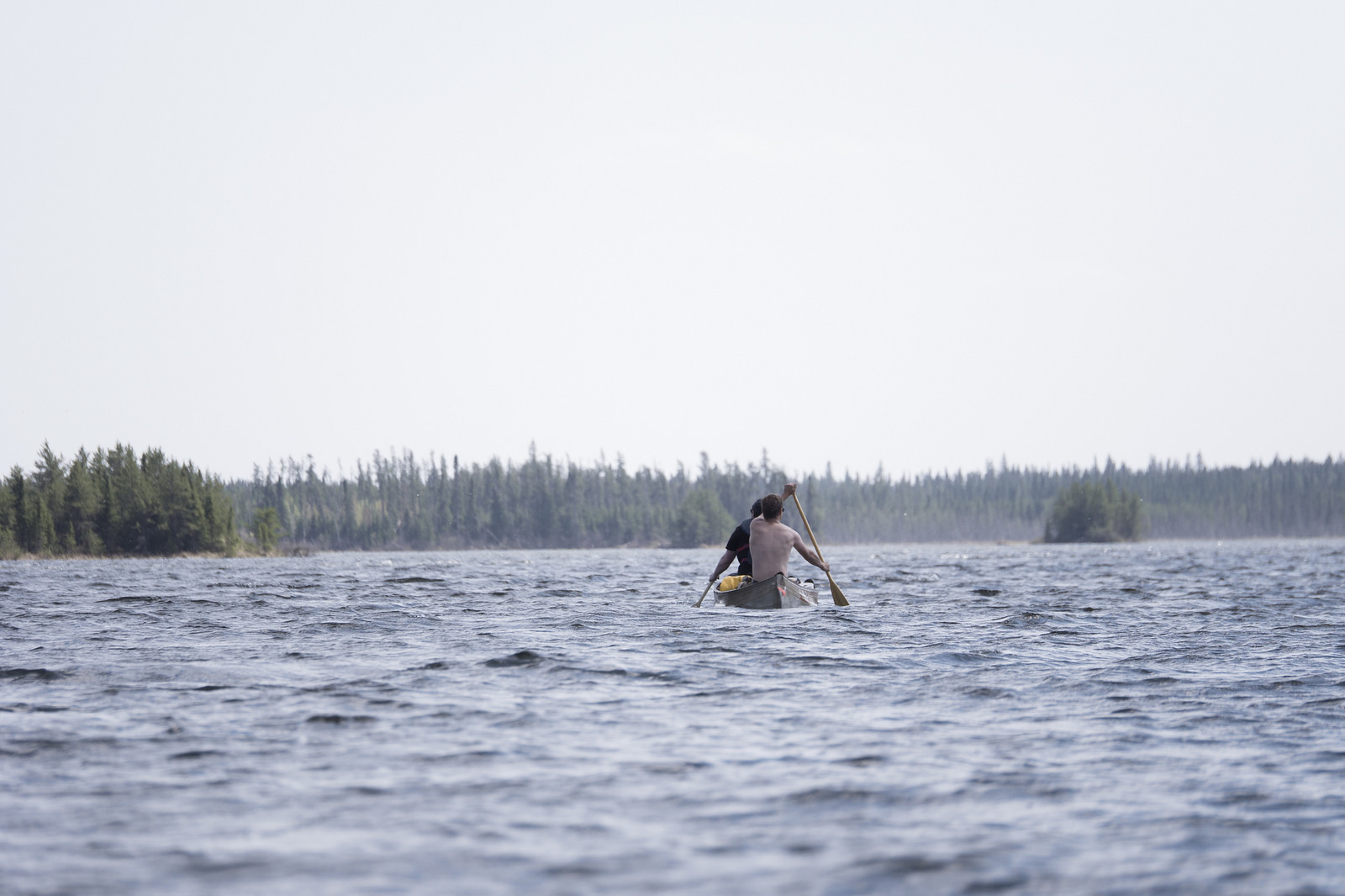 David and Matt, paddling across choppy water—this is one of the calmer sections that feels safe enough to use my camera.