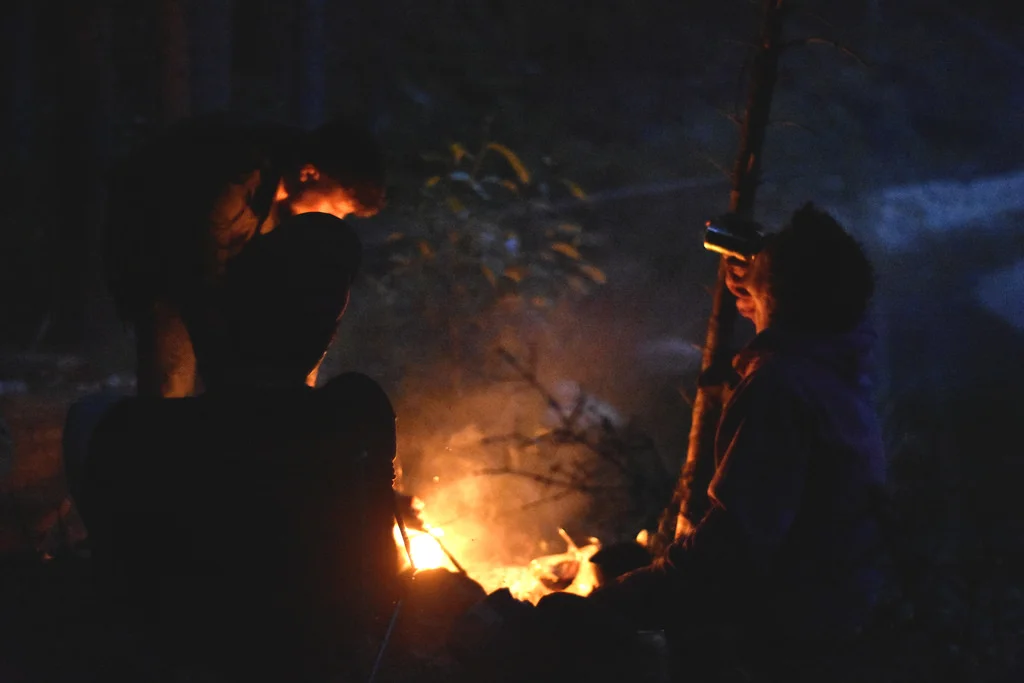 The campfire is less for heat and more for ridding mosquitoes.