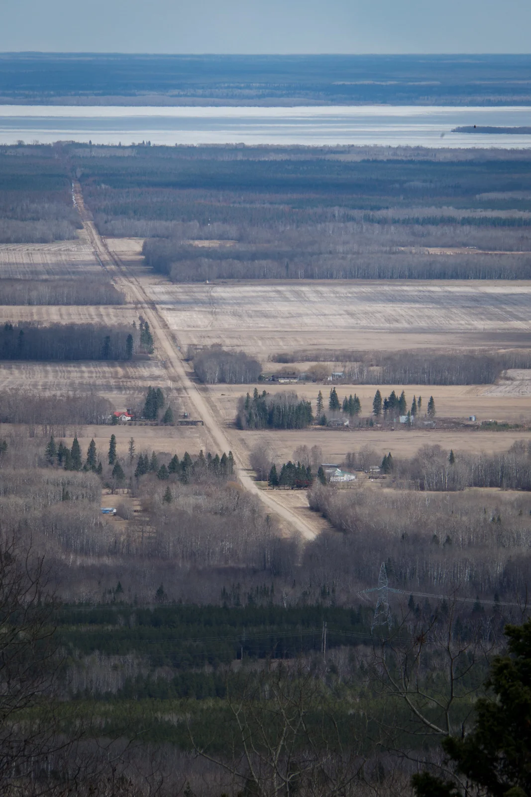 Bellsite and road leading to Swan Lake, photographed from the northeast ridge of Bell River Canyon (Goodson)