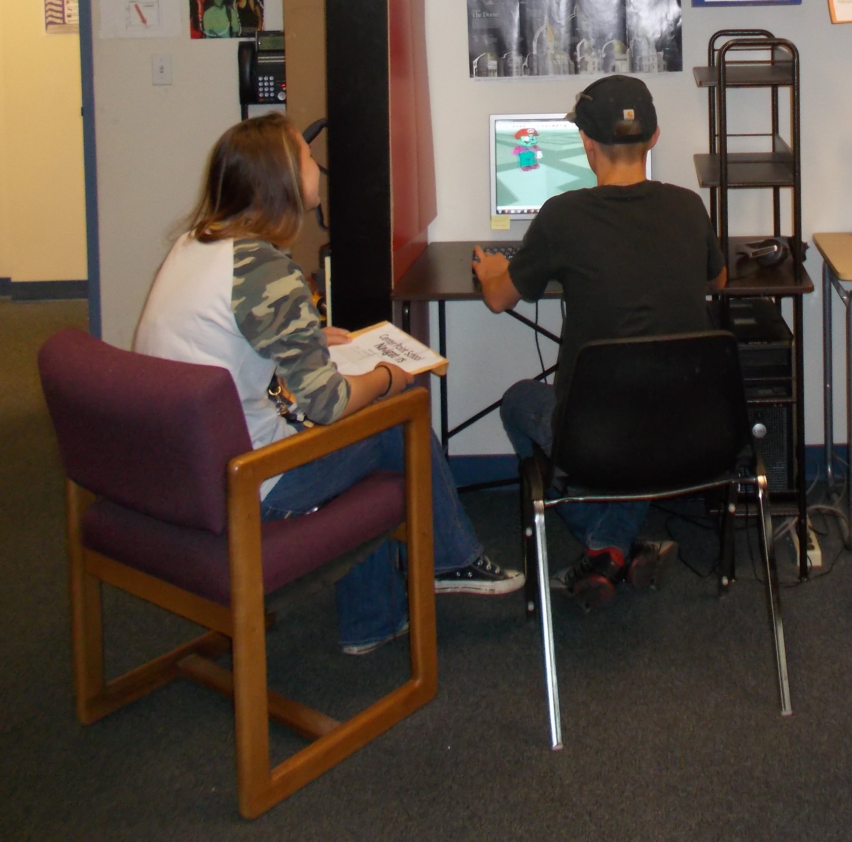  A Center Point student demonstrates his computer skills to a visitor 