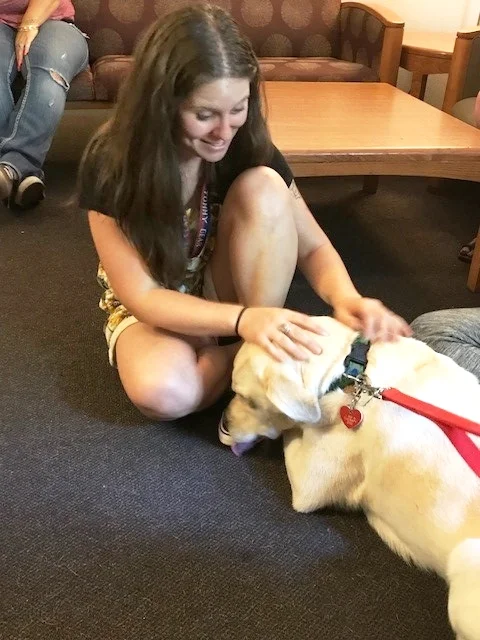 Bailey (left) enjoying some affection from Tina.