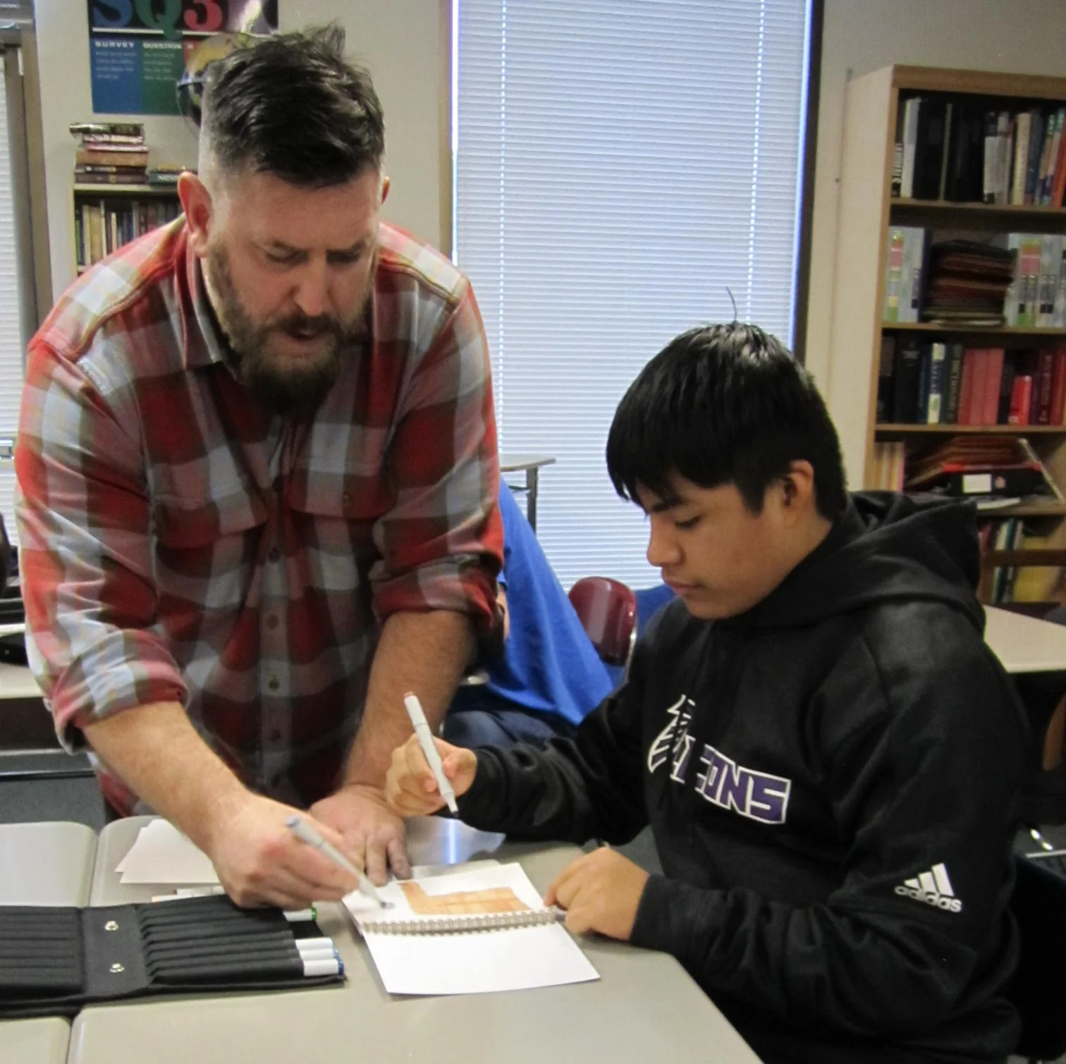 Graphic Artist Shares Knowledge With Looking Glass Youth