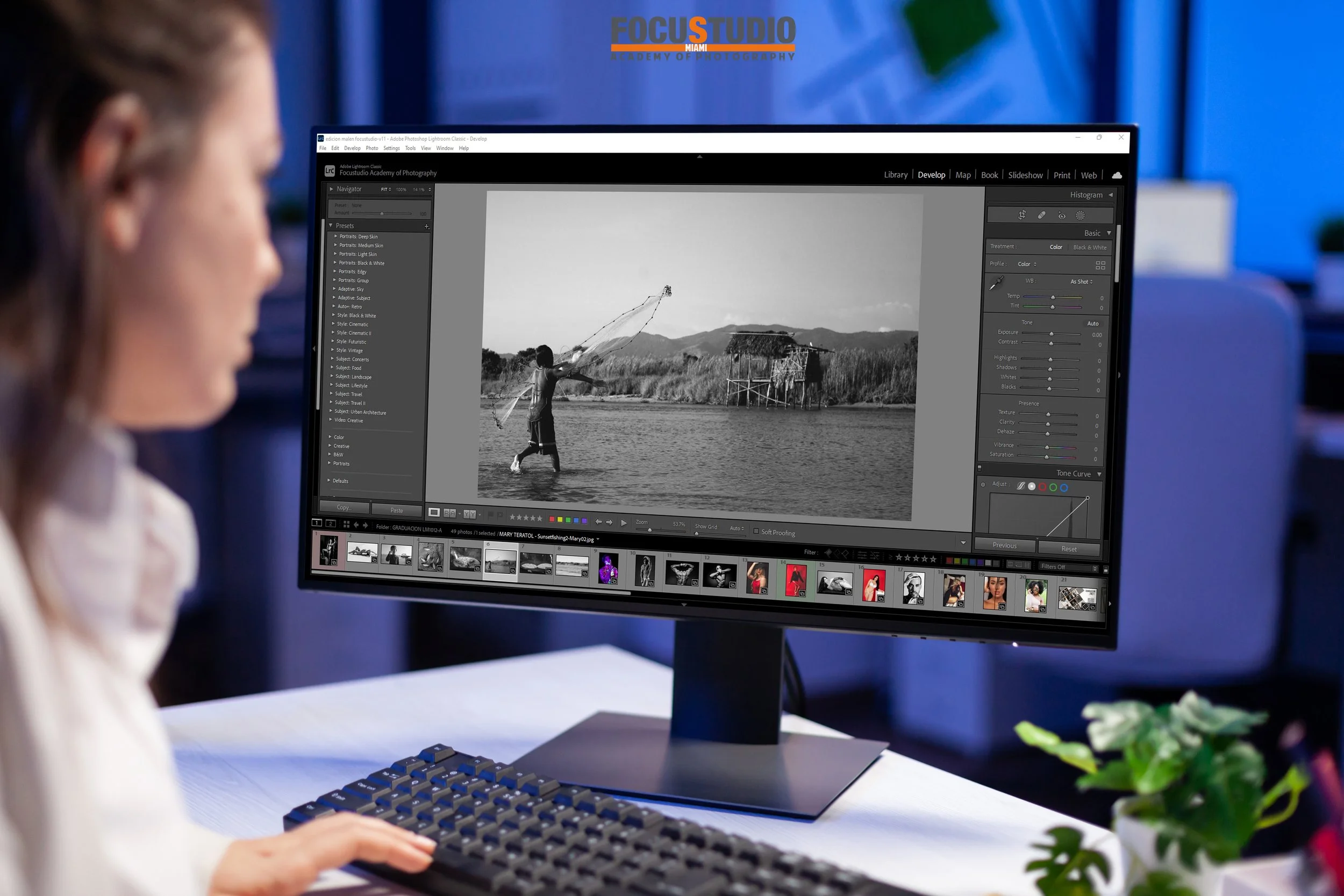 Focused editor retoucher editing color grade on professional com